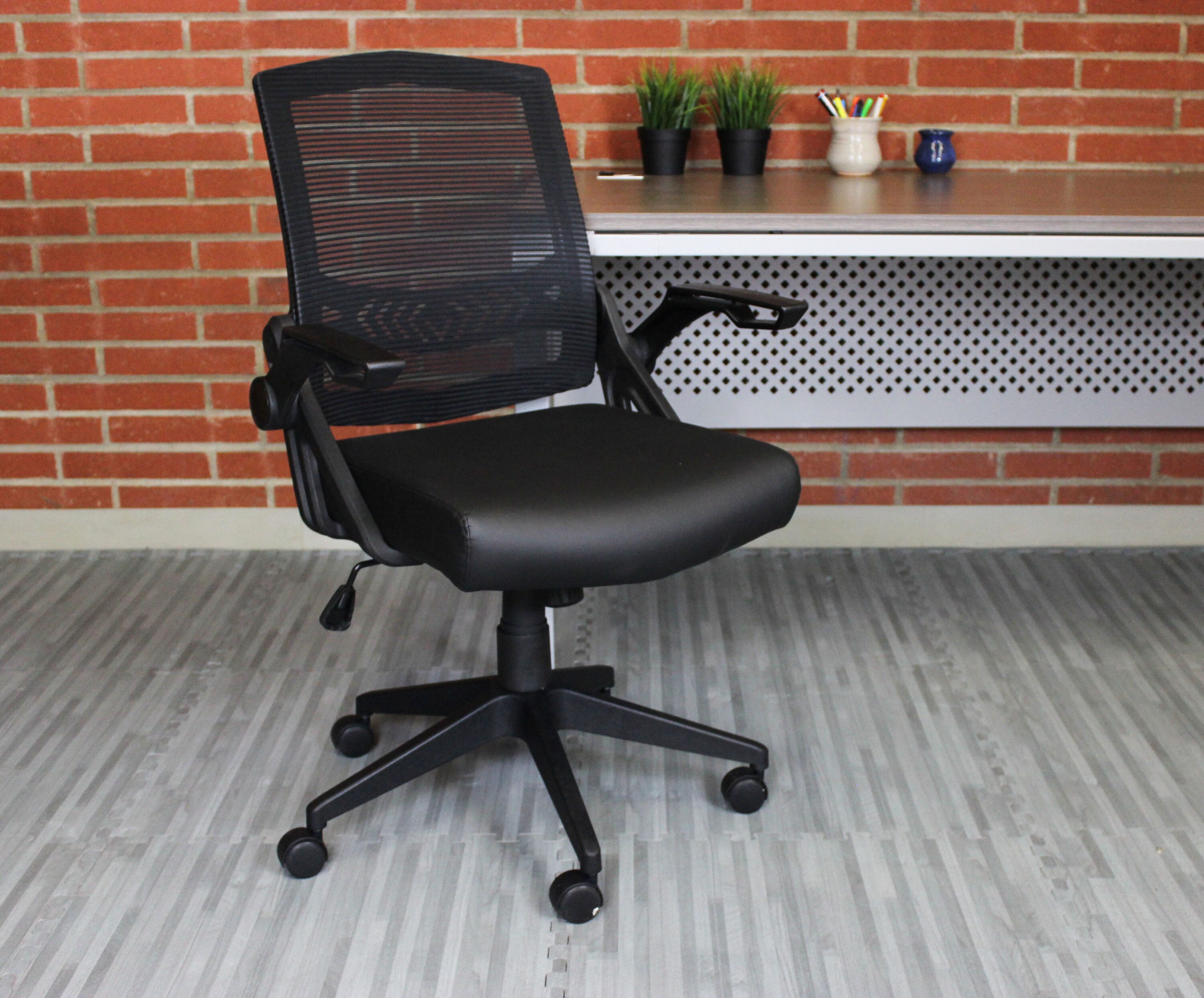 Adjustable Black Mesh Task Chair with Flip Arms