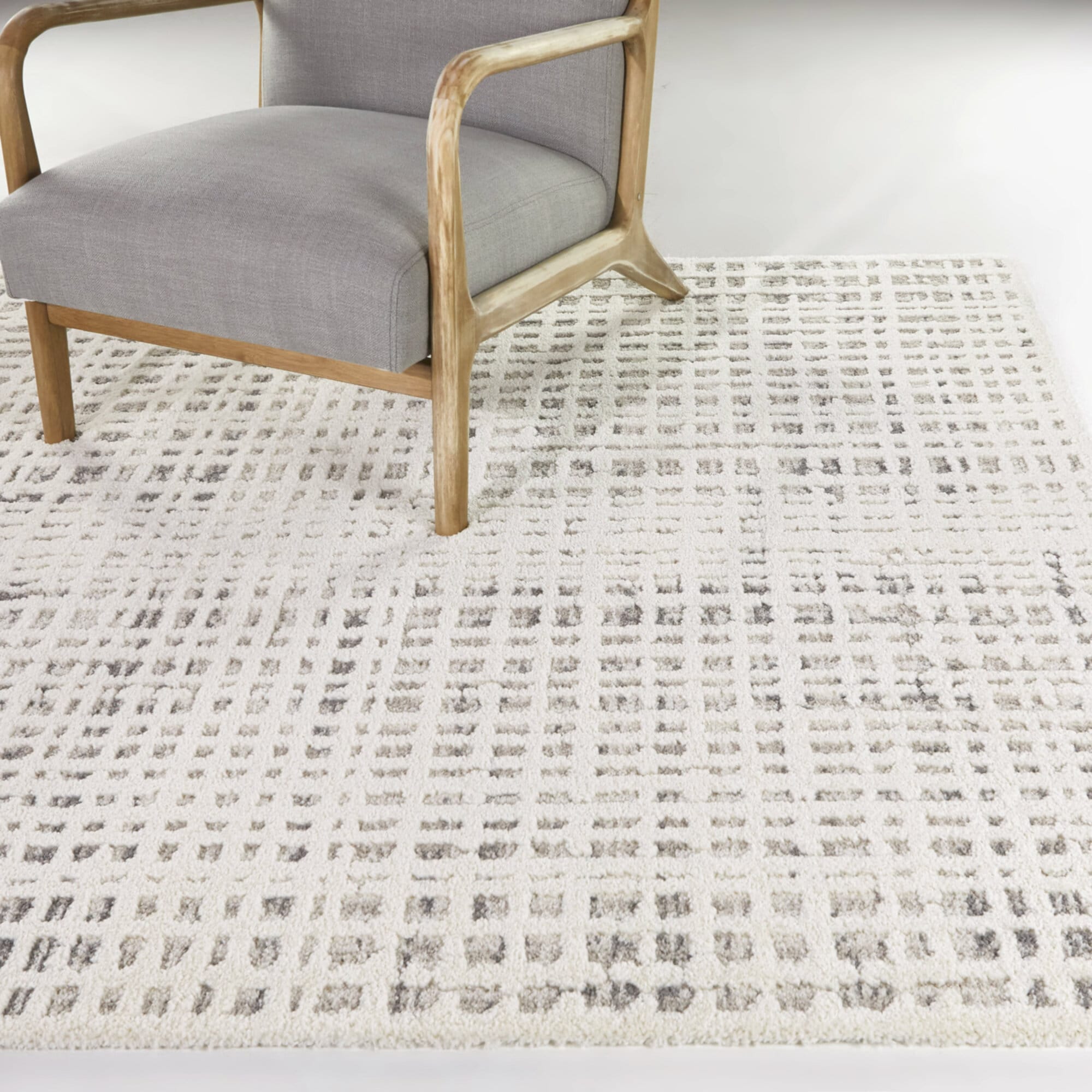 Cream and Gray Abstract Synthetic Rectangular Rug 5'3" x 7'