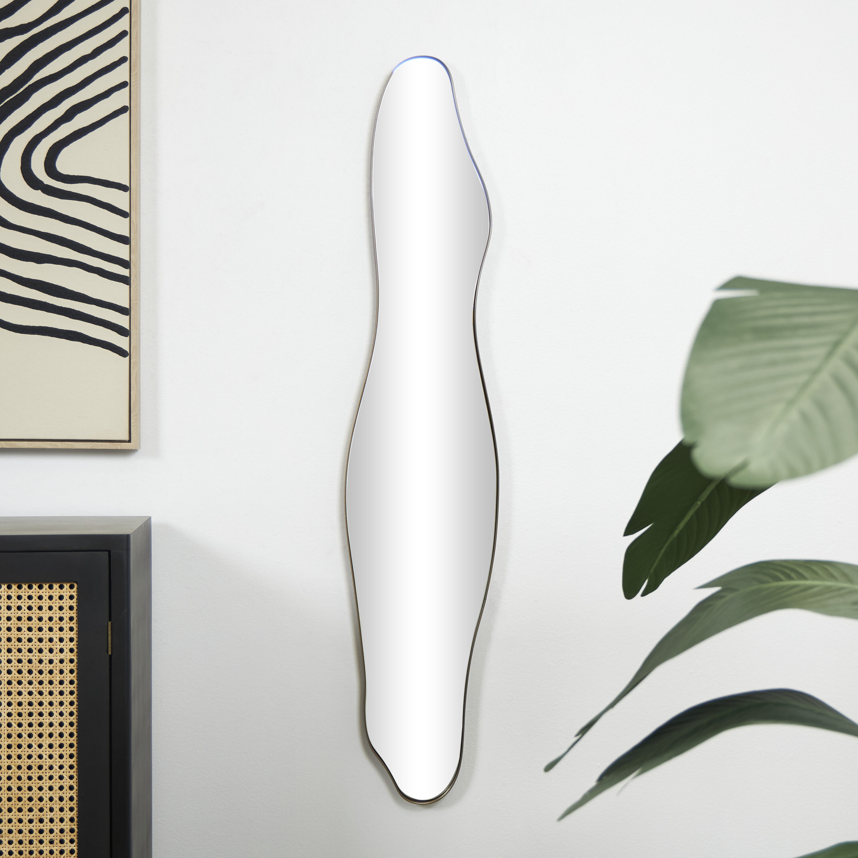 CosmoLiving by Cosmopolitan 821947 9.75-in W x 47.25-in H Irregular Gold Slim Wavy Framed Wall Mirror