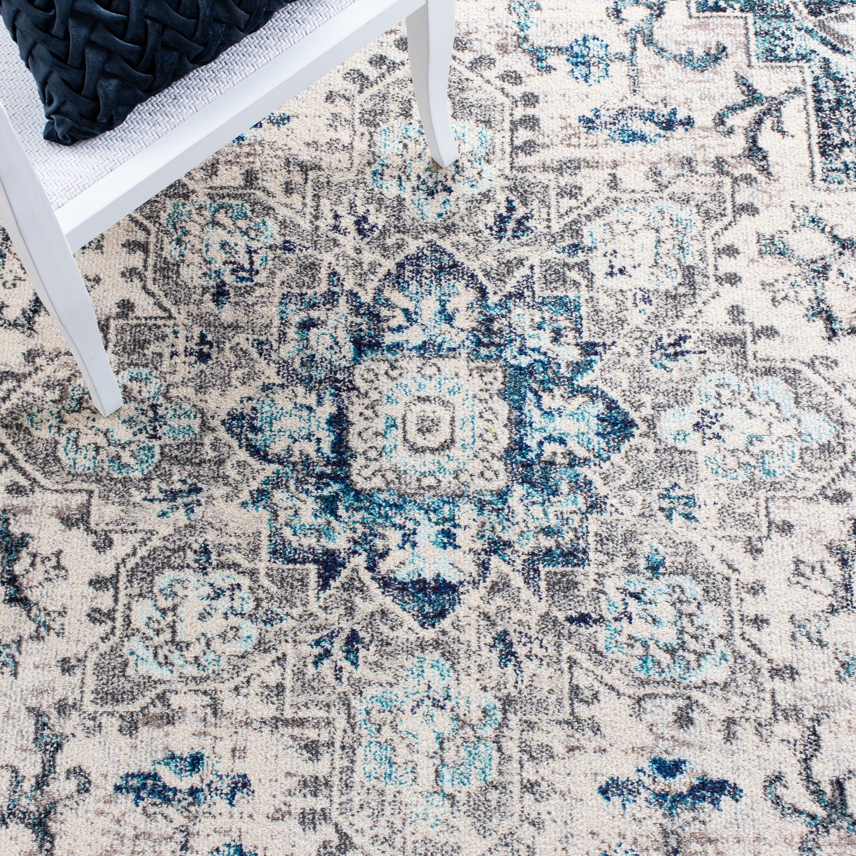 Ivory and Grey Synthetic 6' x 9' Distressed Medallion Area Rug