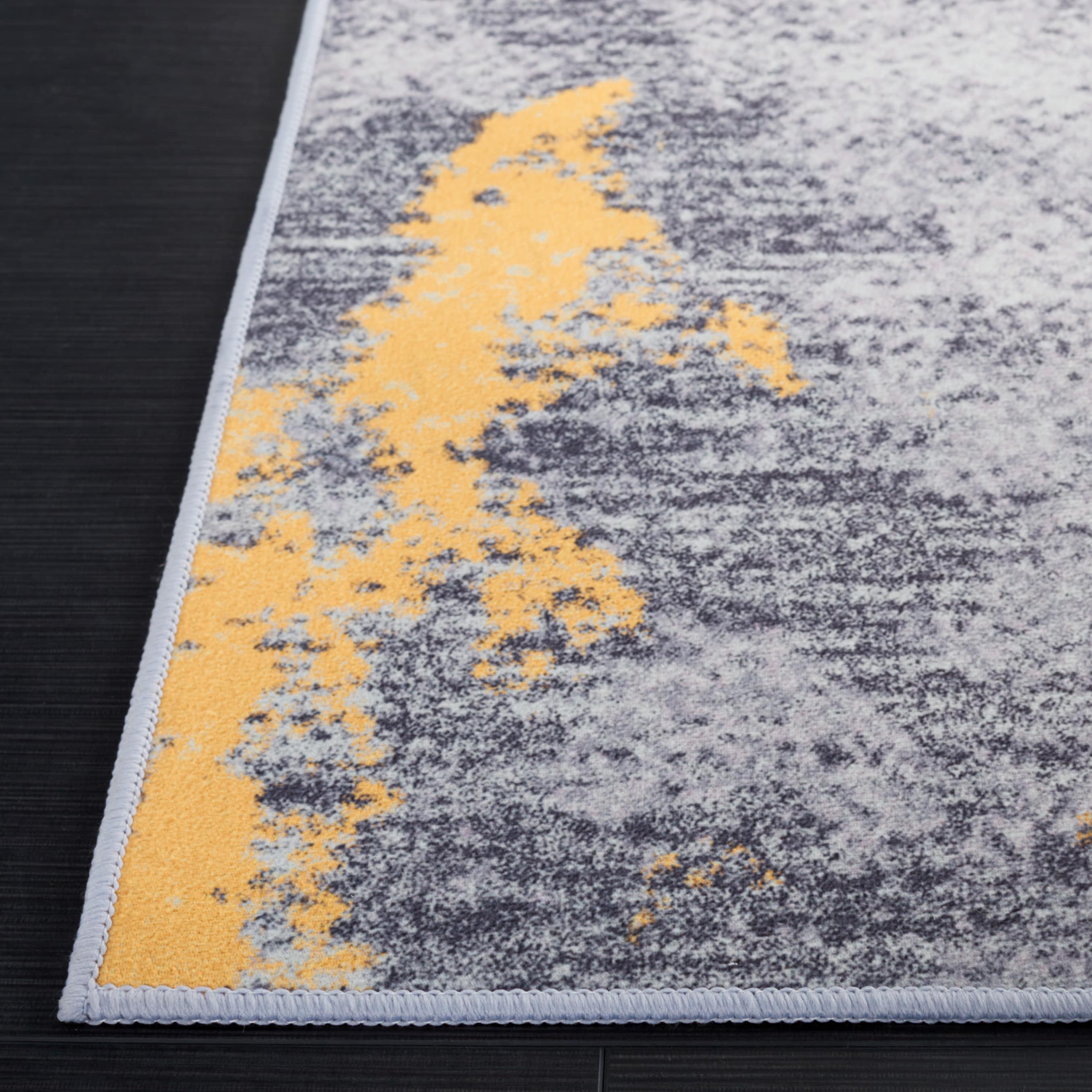 Tacoma 4' x 6' Gray and Gold Synthetic Area Rug