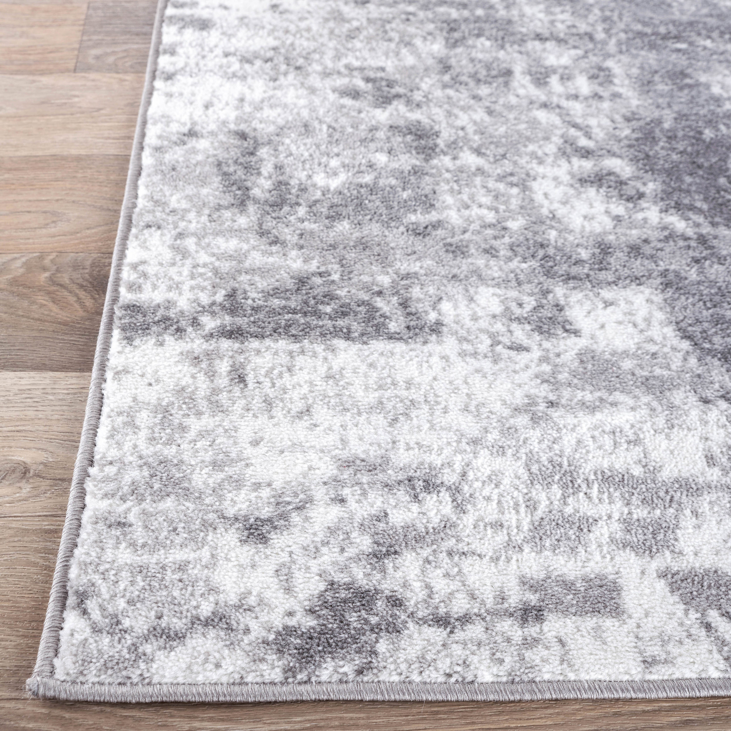 Reversible Distressed Abstract Gray 5' x 7' Synthetic Area Rug