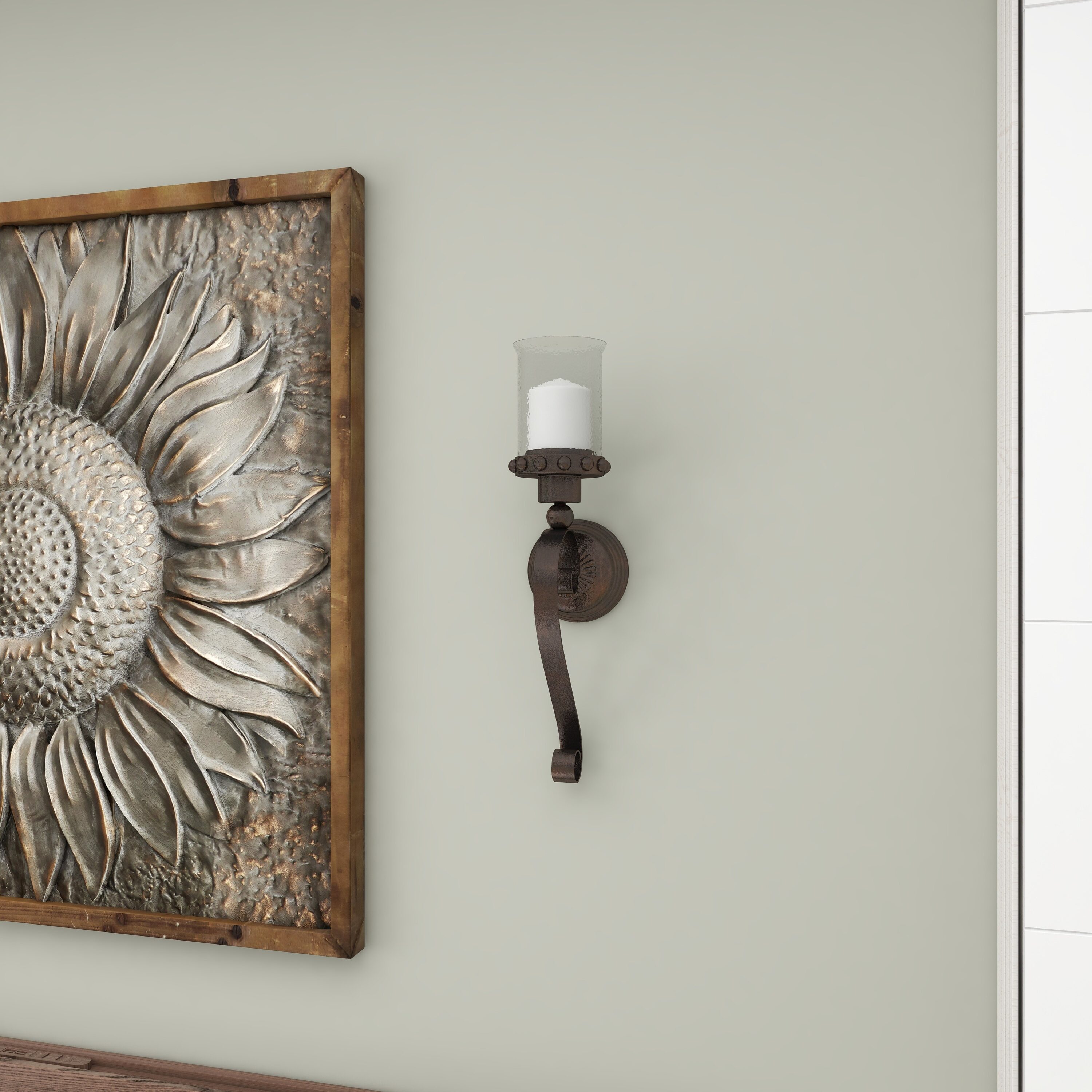 Brown Metal Scroll Wall Sconce with Glass Hurricane