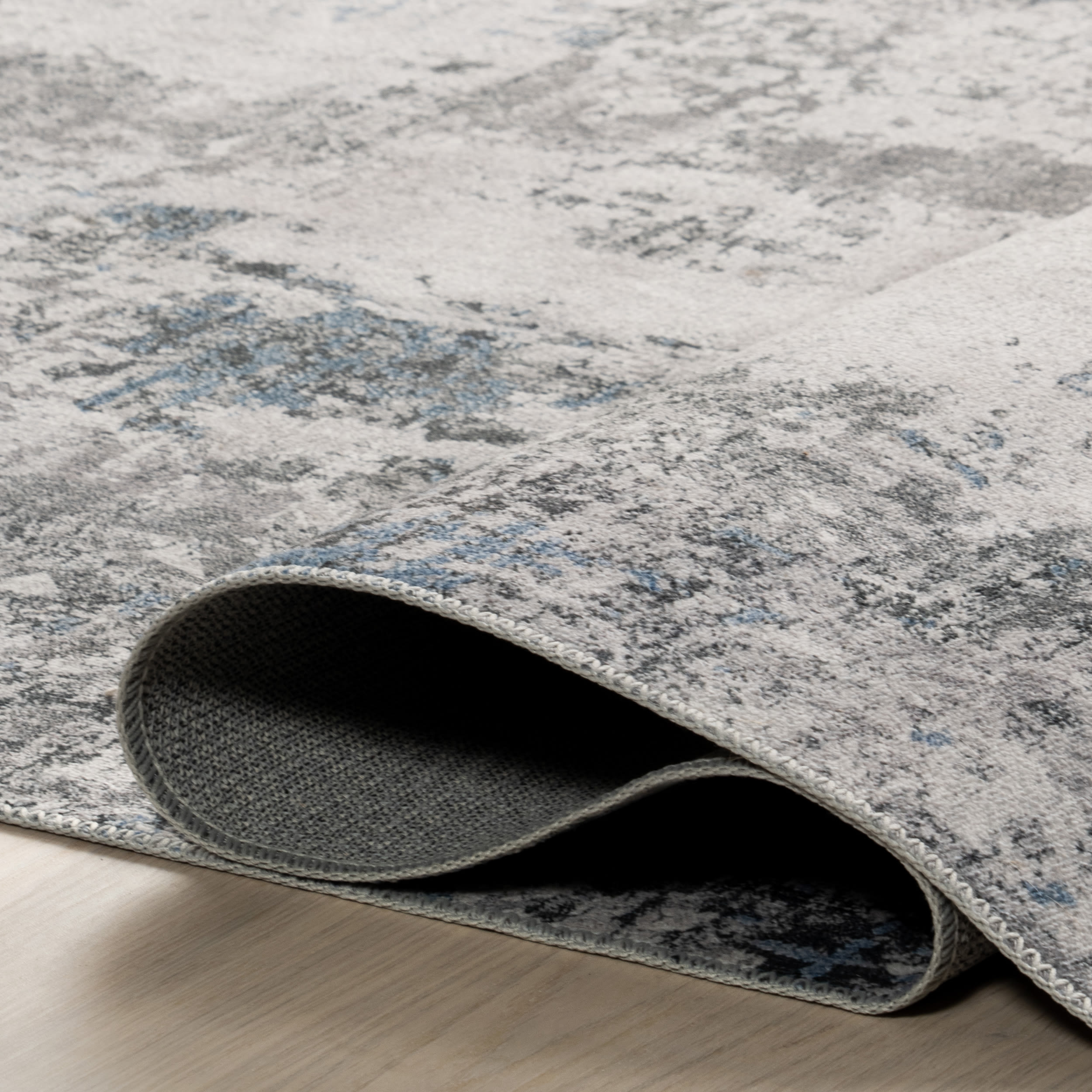 Reversible Abstract Gray Synthetic 4' x 6' Easy-Care Area Rug