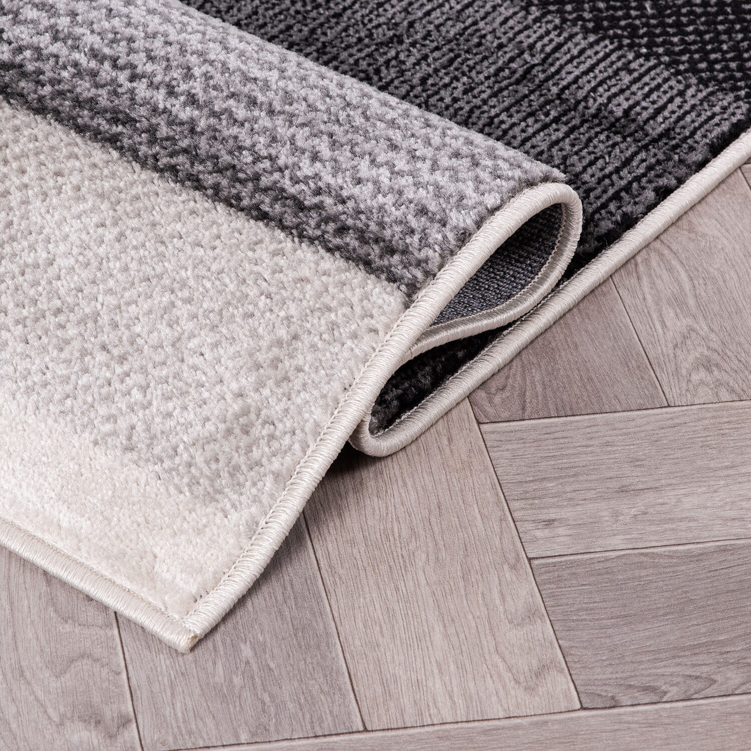Modern Geometric Black and Gray Synthetic Rectangular Area Rug, 5' x 7'