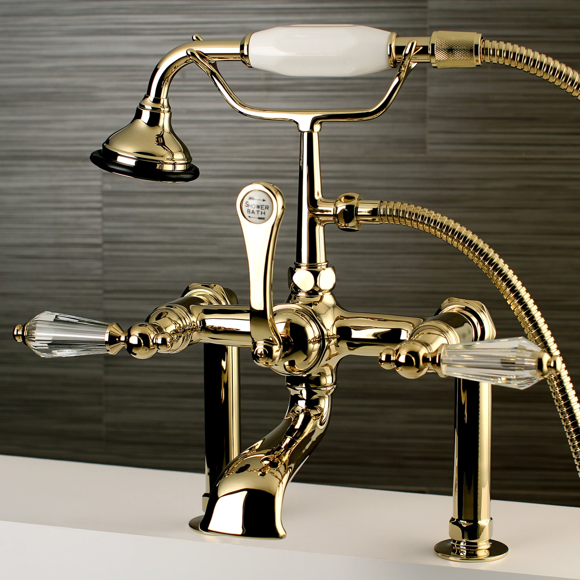 Kingston Brass WLAE103T2WLL Wilshire Polished brass 3-handle Deck-mount Roman Low-arc Bathtub Faucet with Hand Shower ( Valve Included )