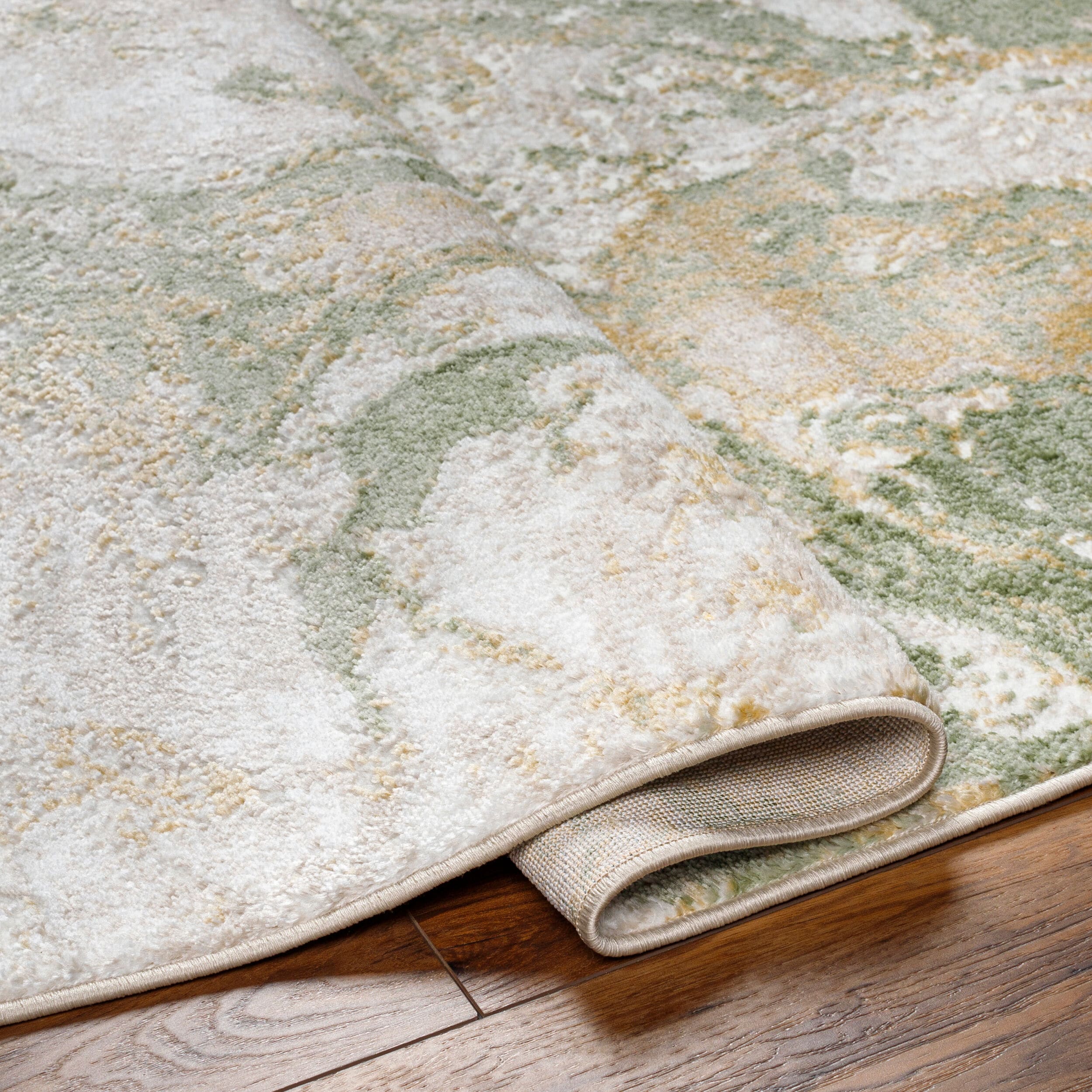 Ivory Spot 5' x 7' Reversible Washable Synthetic Rug