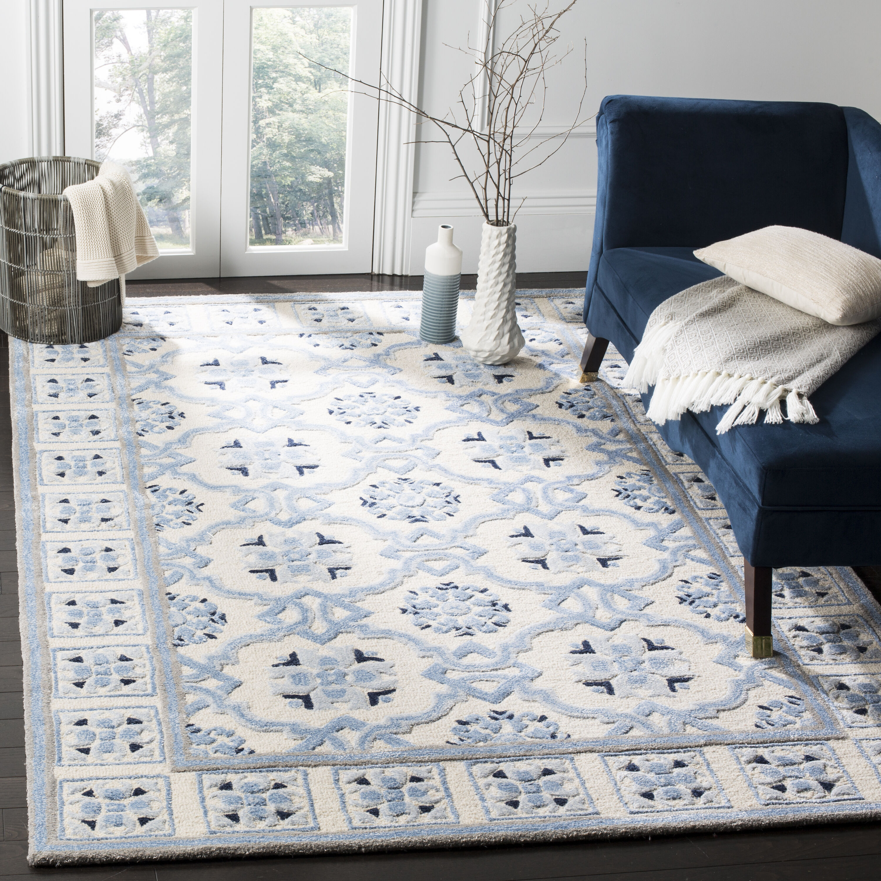 Handmade Ivory and Blue Wool Viscose Tufted Area Rug