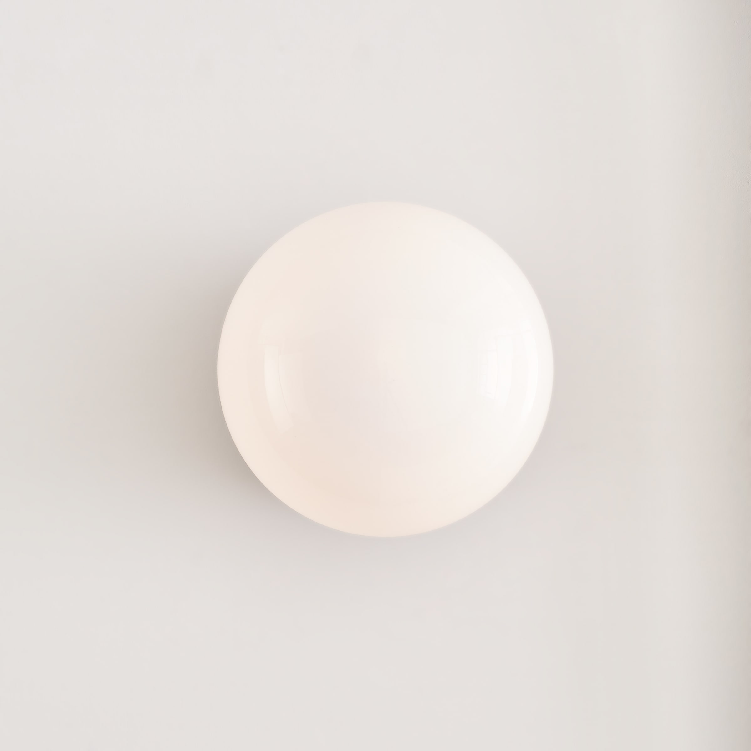 Lune Aged Iron and Milk White Glass Wall Sconce