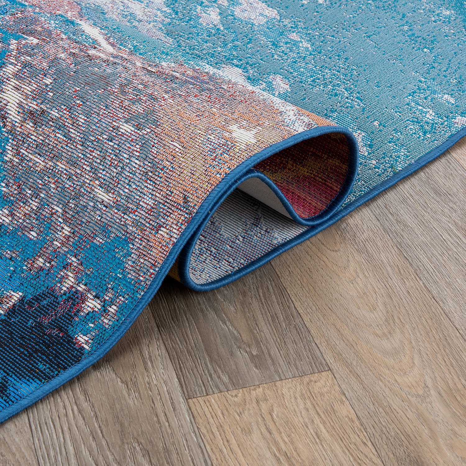 Cosmic Galaxy Red and Blue Rectangular Synthetic Rug 5' x 7'