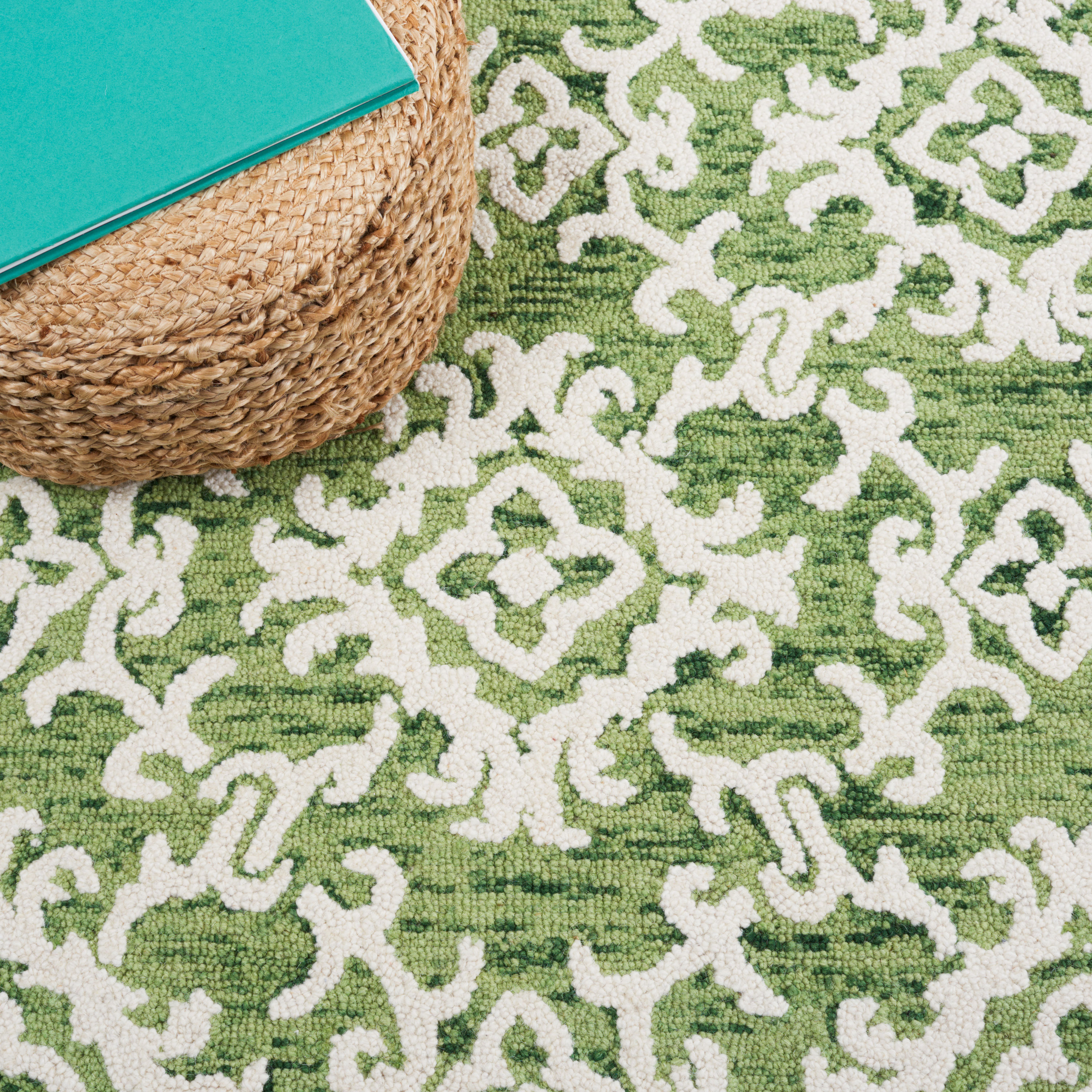 Ivory and Green Tufted Wool 4' x 6' Area Rug