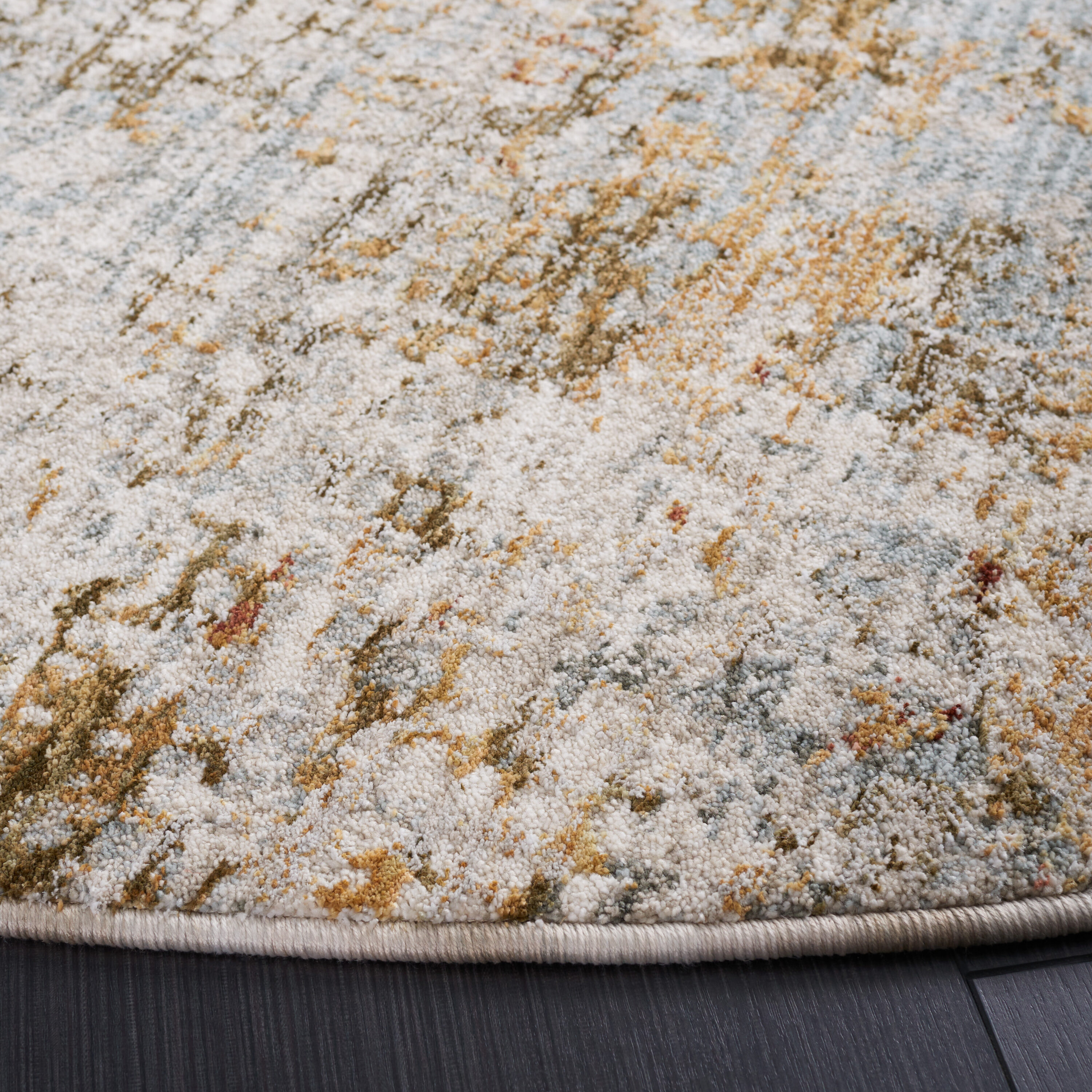 Adrianna Blue and Gold Round Synthetic Area Rug, 6'-7"