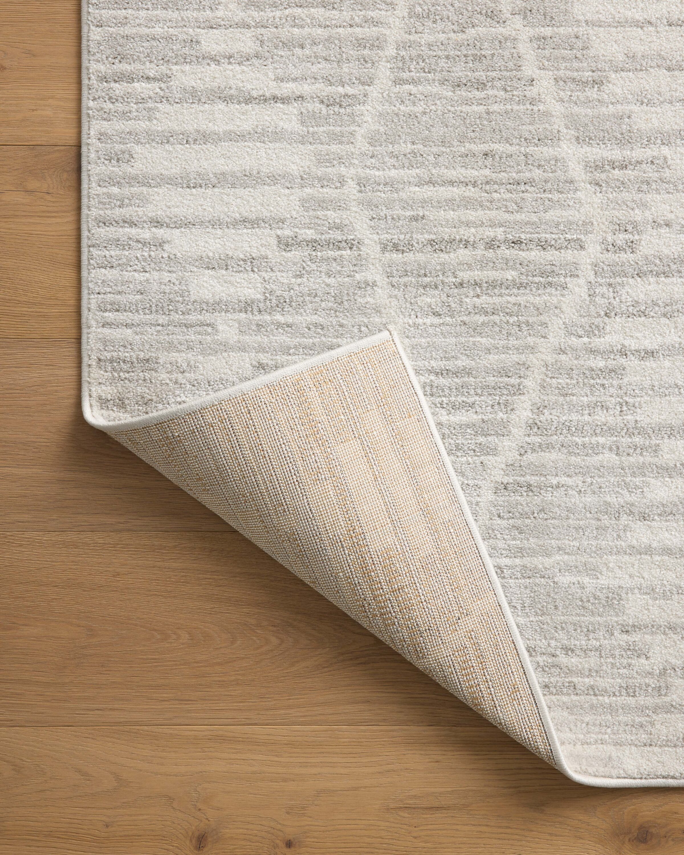 Kamala Ivory and Silver Rectangular Synthetic Area Rug 6'-7" x 9'-6"