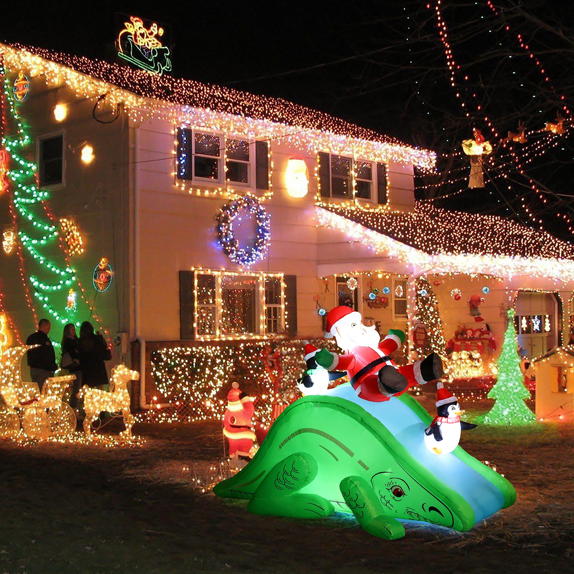 LuxenHome 4-ft Lighted Dinosaur Christmas Inflatable in the Christmas ...