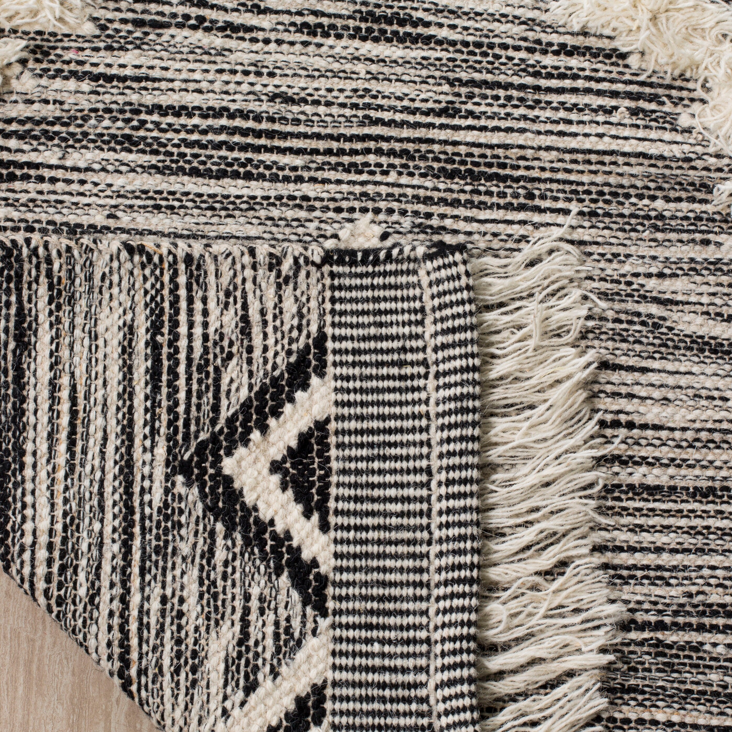 Hand-Knotted Black and Ivory Wool Geometric Area Rug