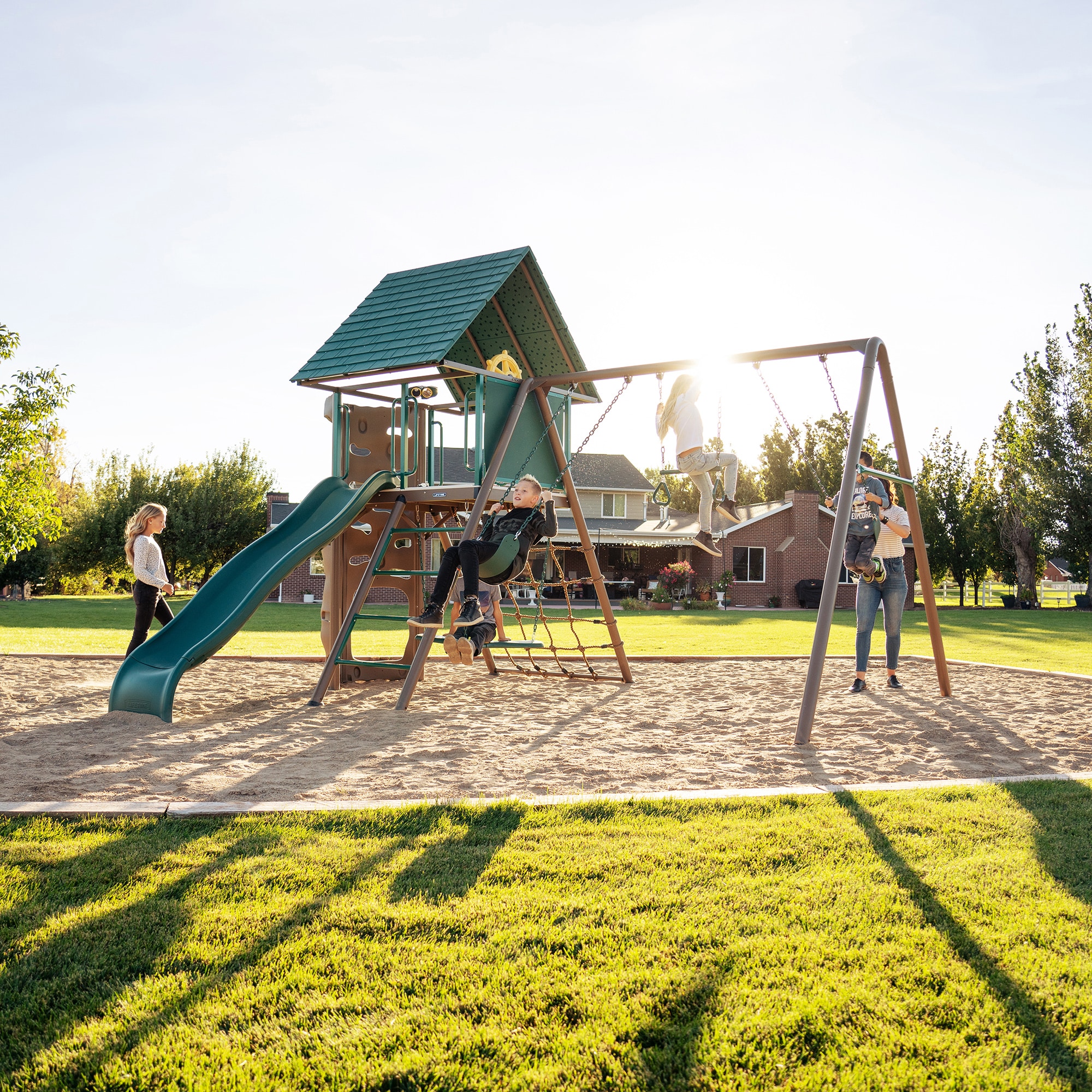 Lifetime Green and Brown Metal Swing Set with Slide and Climbing Wall