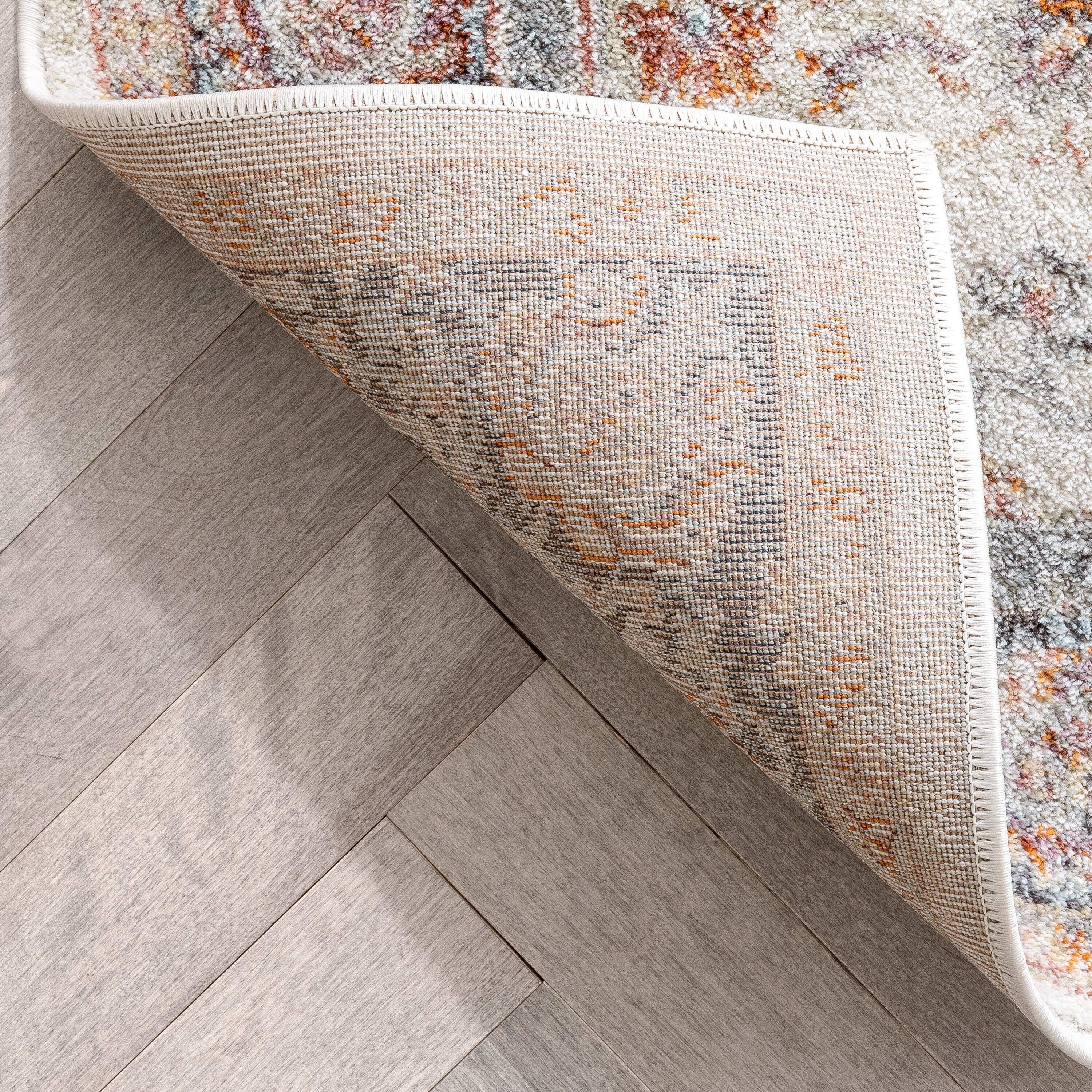 Ivory Floral Synthetic Reversible 5' x 7' Area Rug