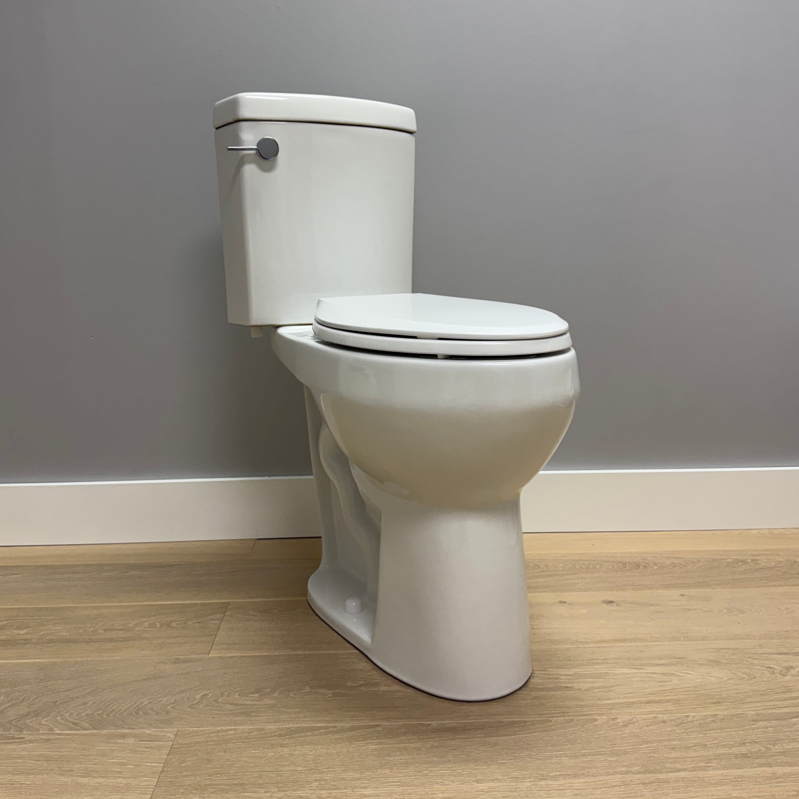 Convenient Height MODEL S Extra Tall Toilets Pearl White Elongated Tall height 12-in Rough-In 1.28 GPF Dual Slow Close Feature 2-piece Toilet