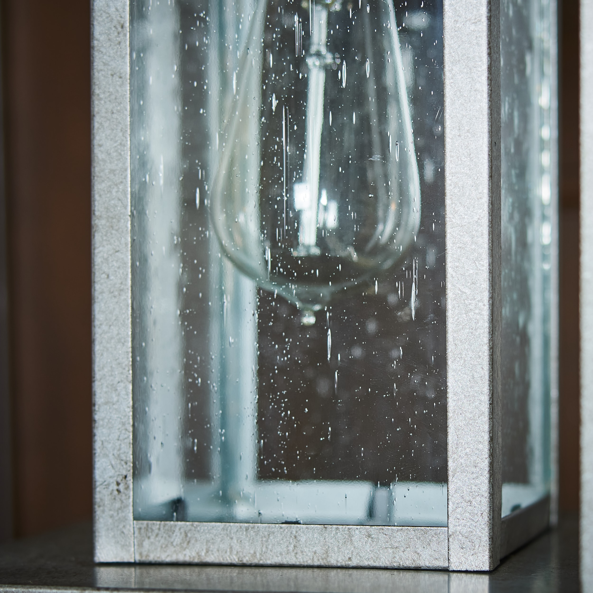Hunnington 1-Light Outdoor Pendant in Weathered Pewter with Clear Seeded Glass