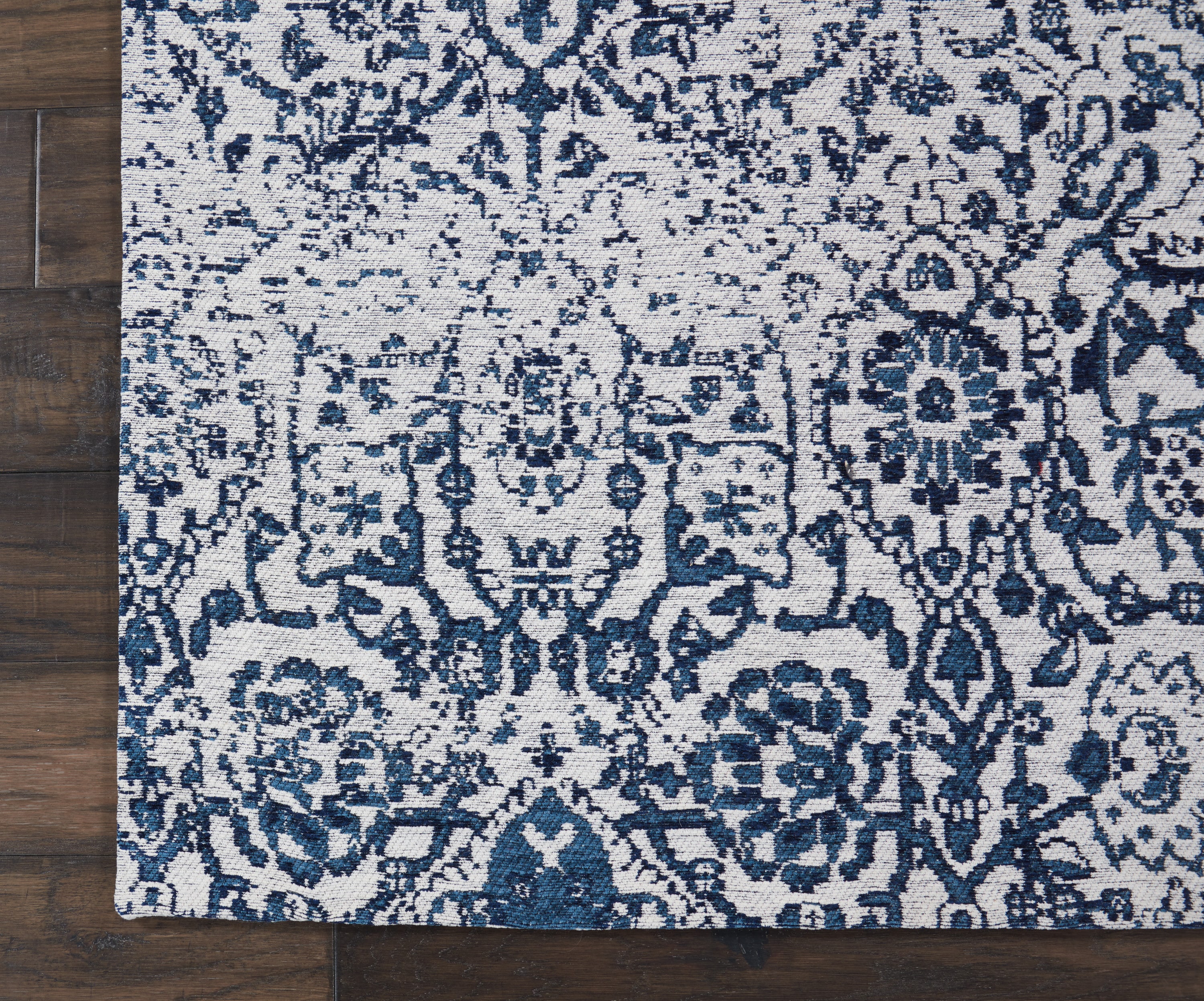 Ivory and Navy Floral Synthetic Large Rectangular Rug