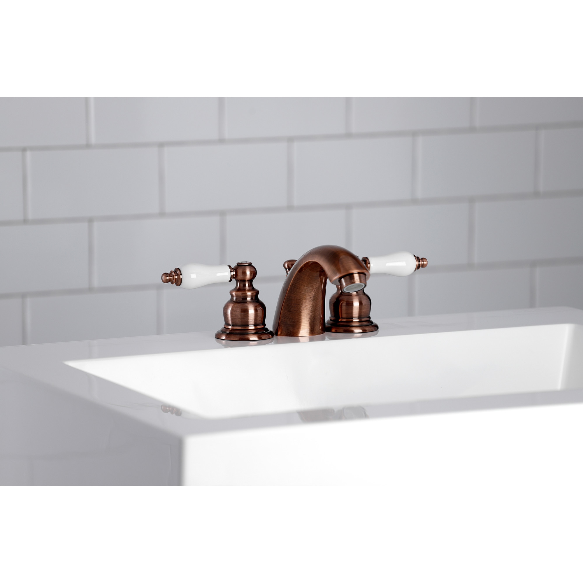 Kingston Brass WLKB956PL Victorian Antique copper Widespread 2-handle Low-arc Residential Handle Bathroom Sink Faucet with Drain