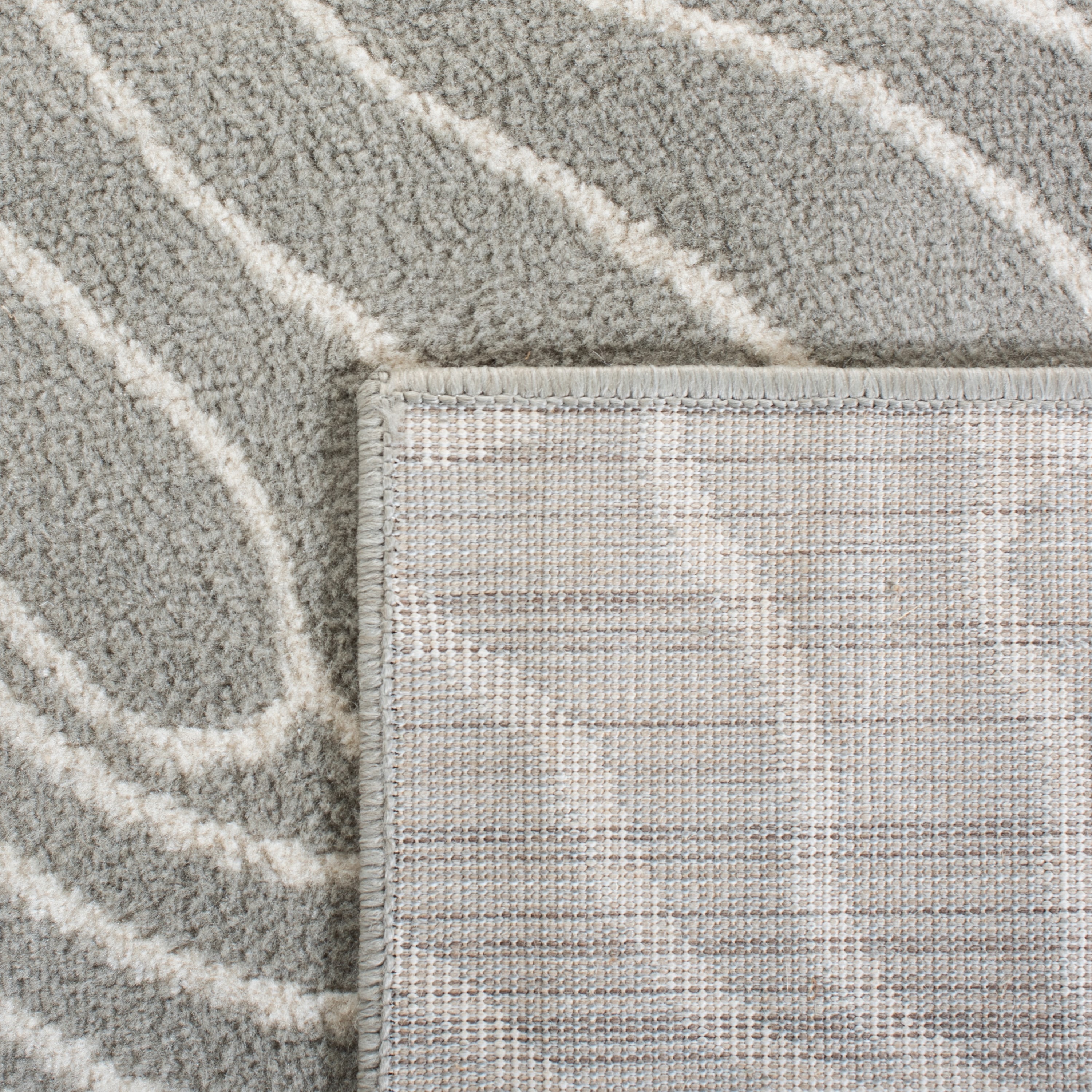 Gray and Ivory Abstract Synthetic 4' x 6' Area Rug