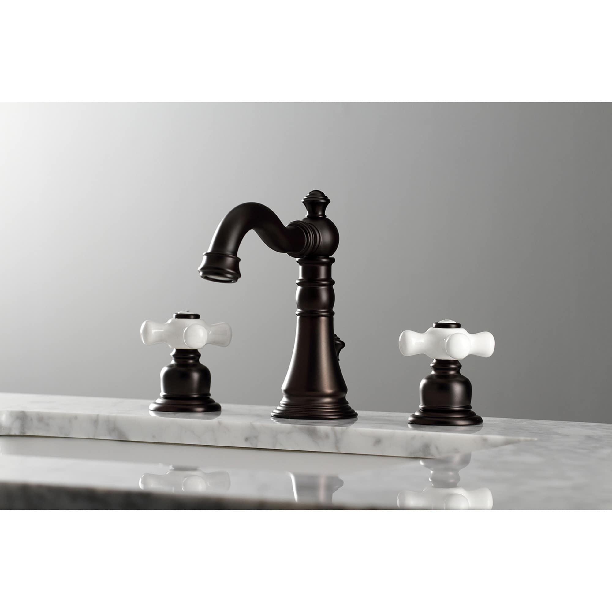 Kingston Brass WLFSC1975PX American Classic Oil-rubbed bronze Widespread 2-handle Low-arc Residential Handle Bathroom Sink Faucet with Drain