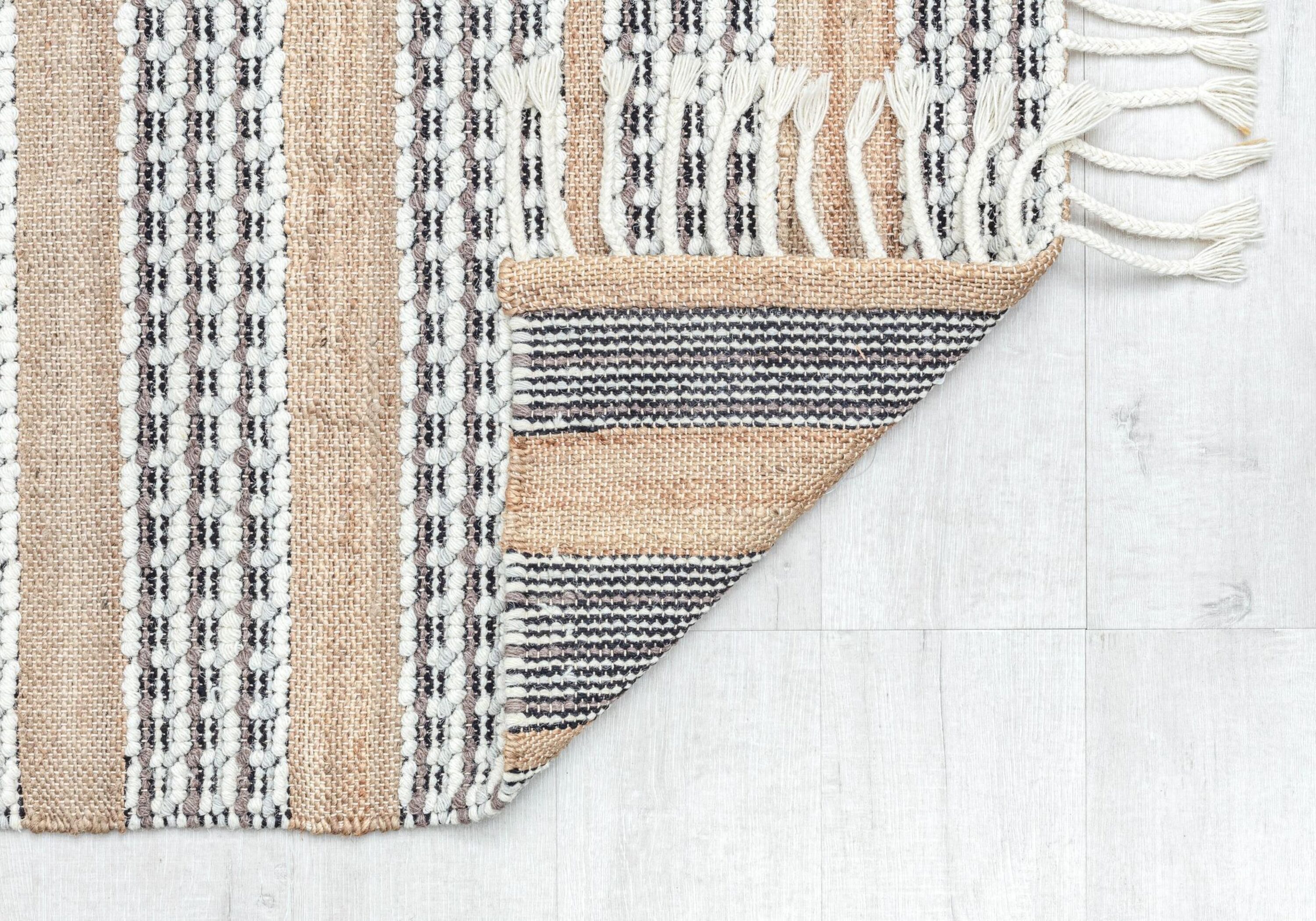 Handmade Natural Jute and Wool Striped Area Rug with Tassels