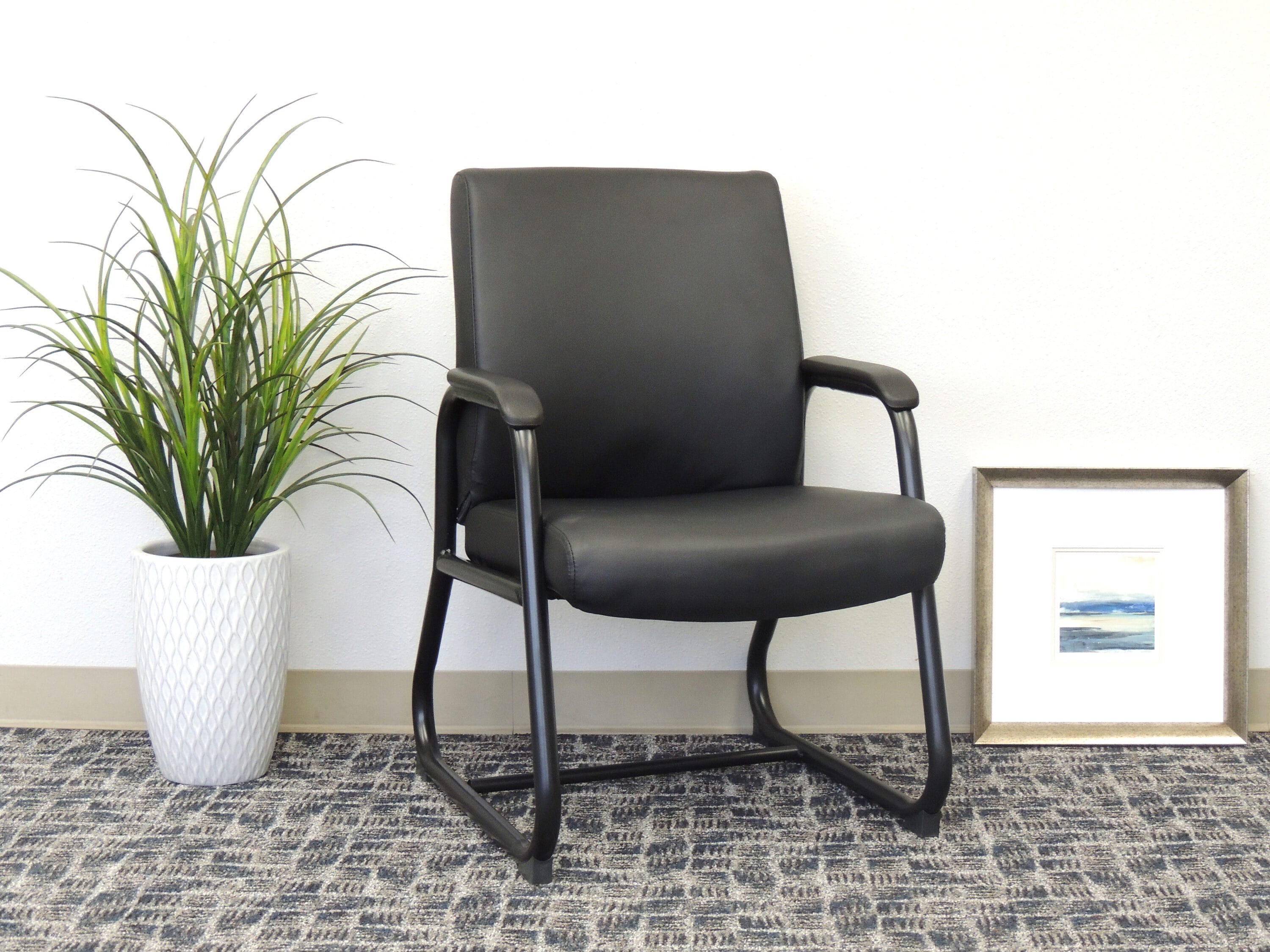 Sleek Minimalist Heavy Duty Guest Chair in Black Caressoft