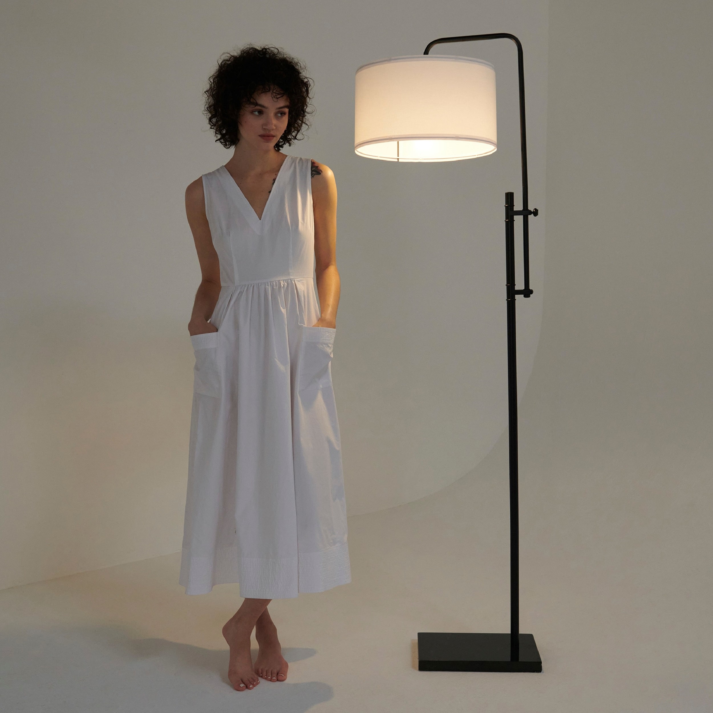Leo Adjustable Black Arc Floor Lamp with White Fabric Shade