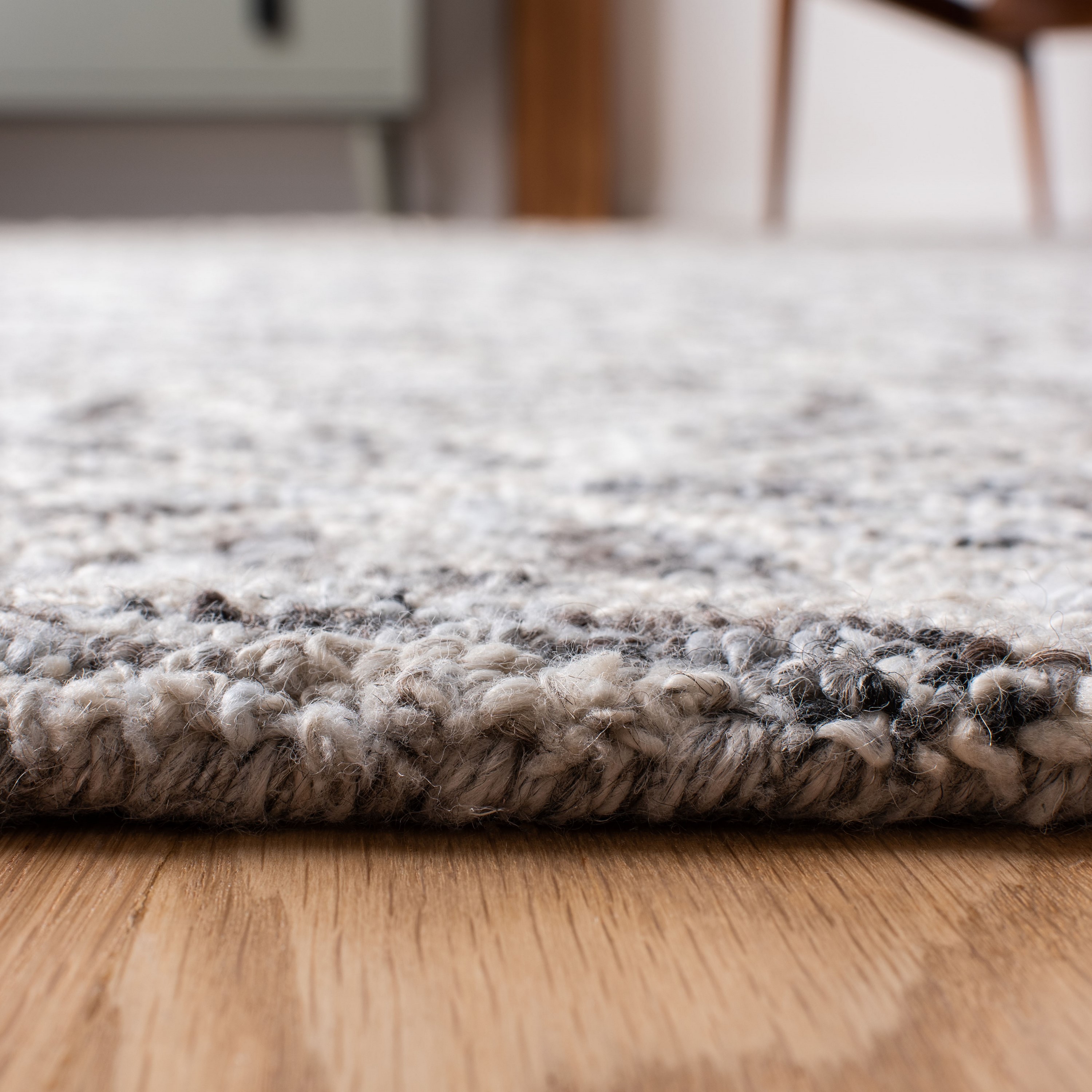 Handmade Abstract Gray and Beige Tufted Wool Rug - 27" x 7"