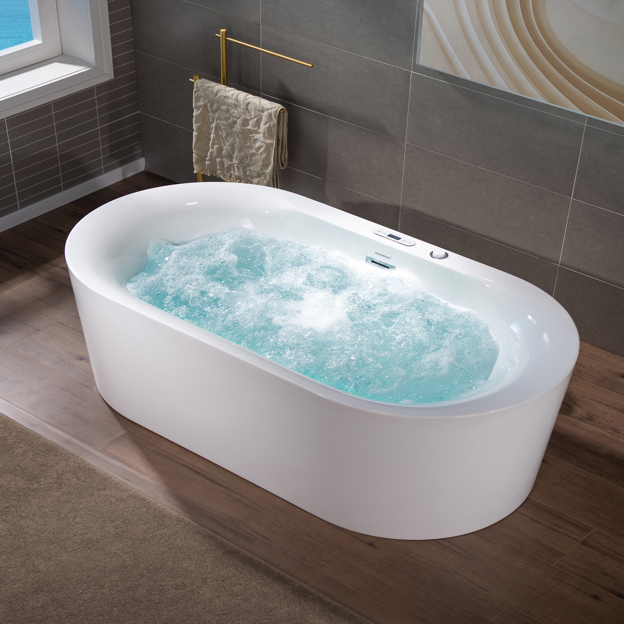 Woodbridge LB610 35.38-in x 72-in White with Chrome Trim Acrylic Oval Freestanding Whirlpool and Air Bath Combination Tub with Drain ( Center Drain )