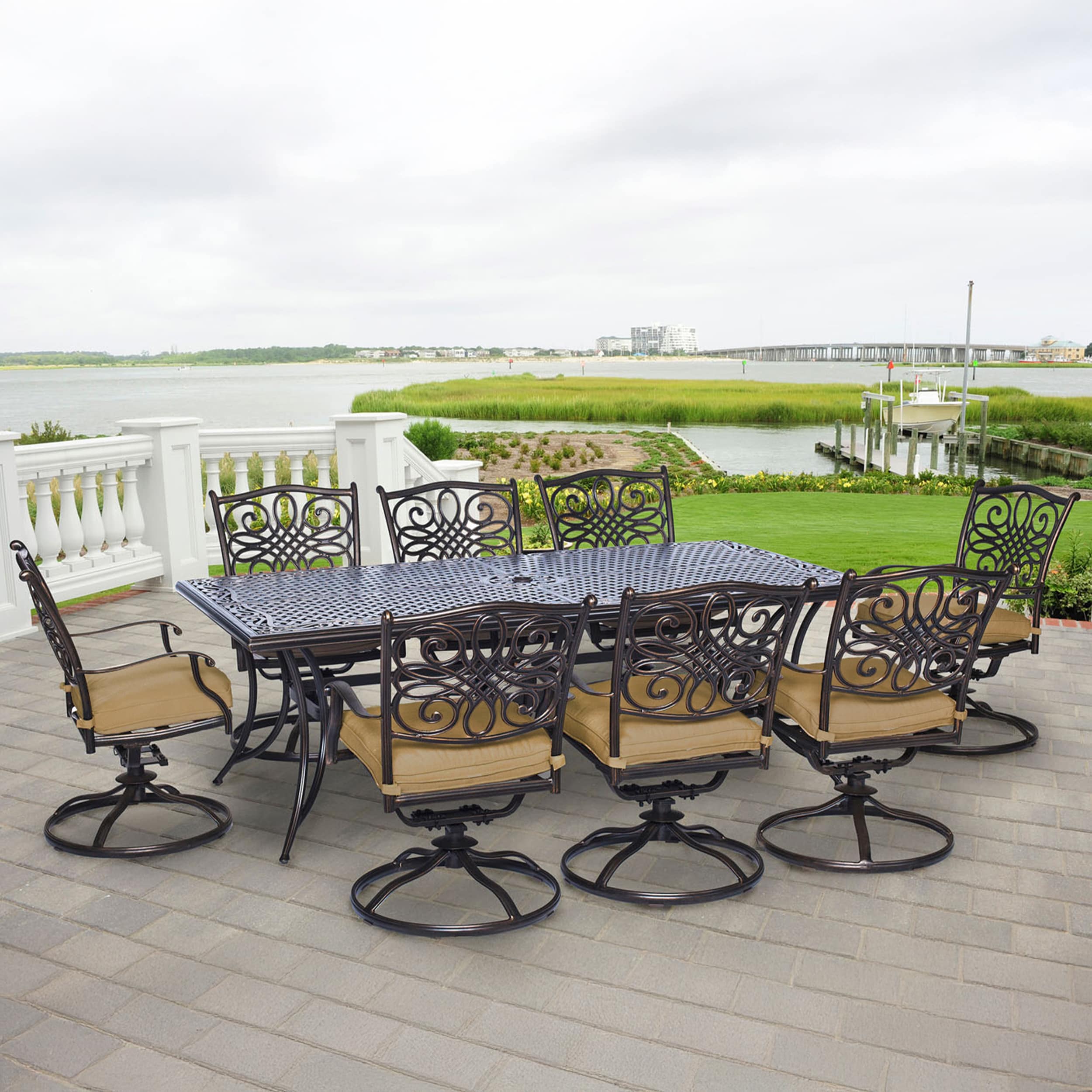Hanover TRADDN9PCSW-8 Traditions 9 -Piece Bronze Patio Dining Set Aluminum Rectangle Table with 8 Tan Cushions Swivel Rocker Chairs
