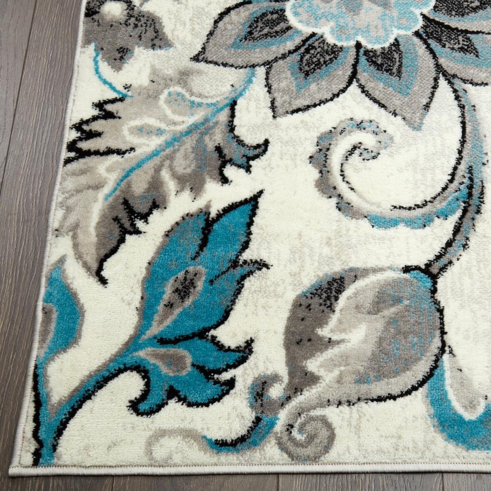 Ivory Floral Tufted 64" Synthetic Easy-Care Area Rug