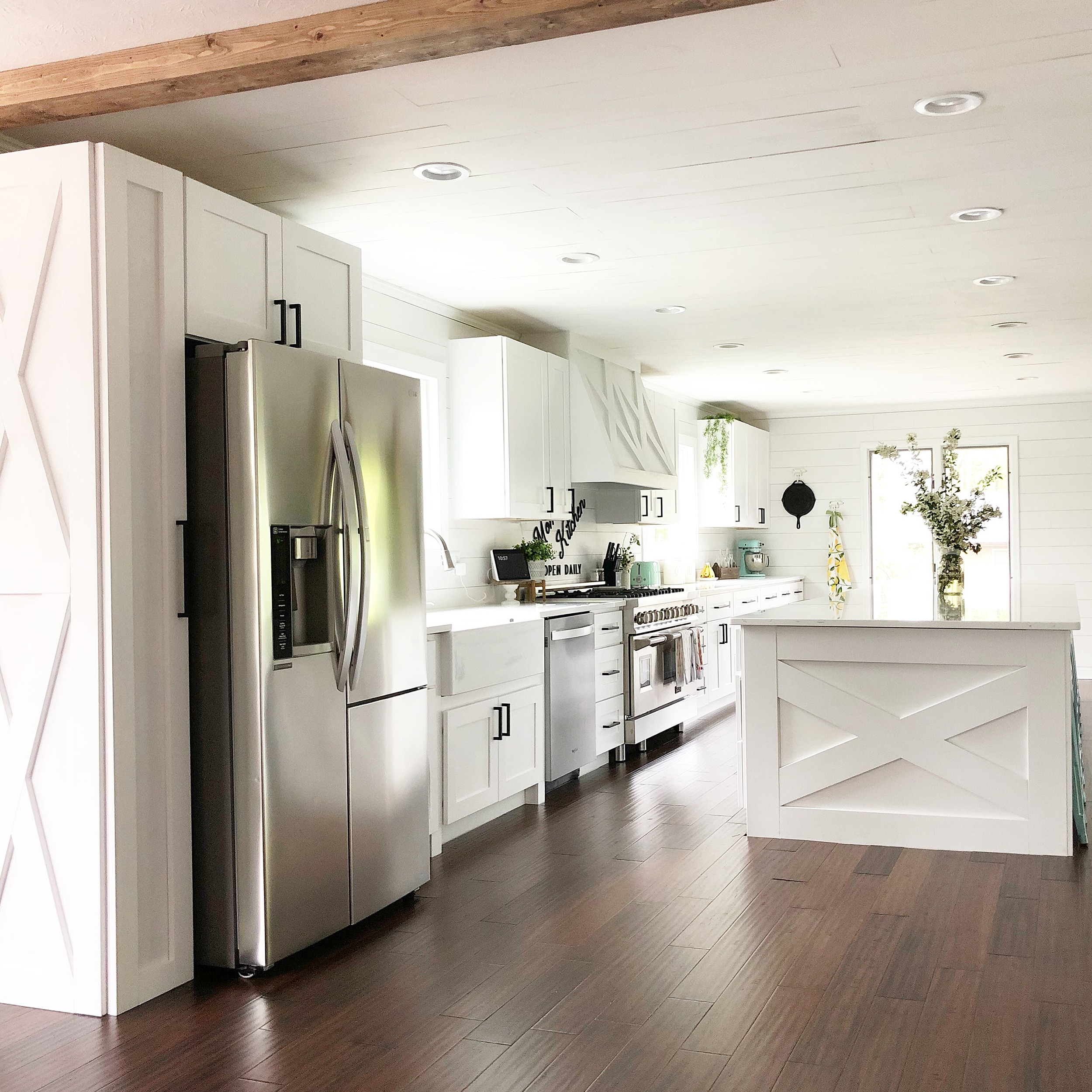 White Laundry Room with Apron Sink and Gray wash Wood Floors