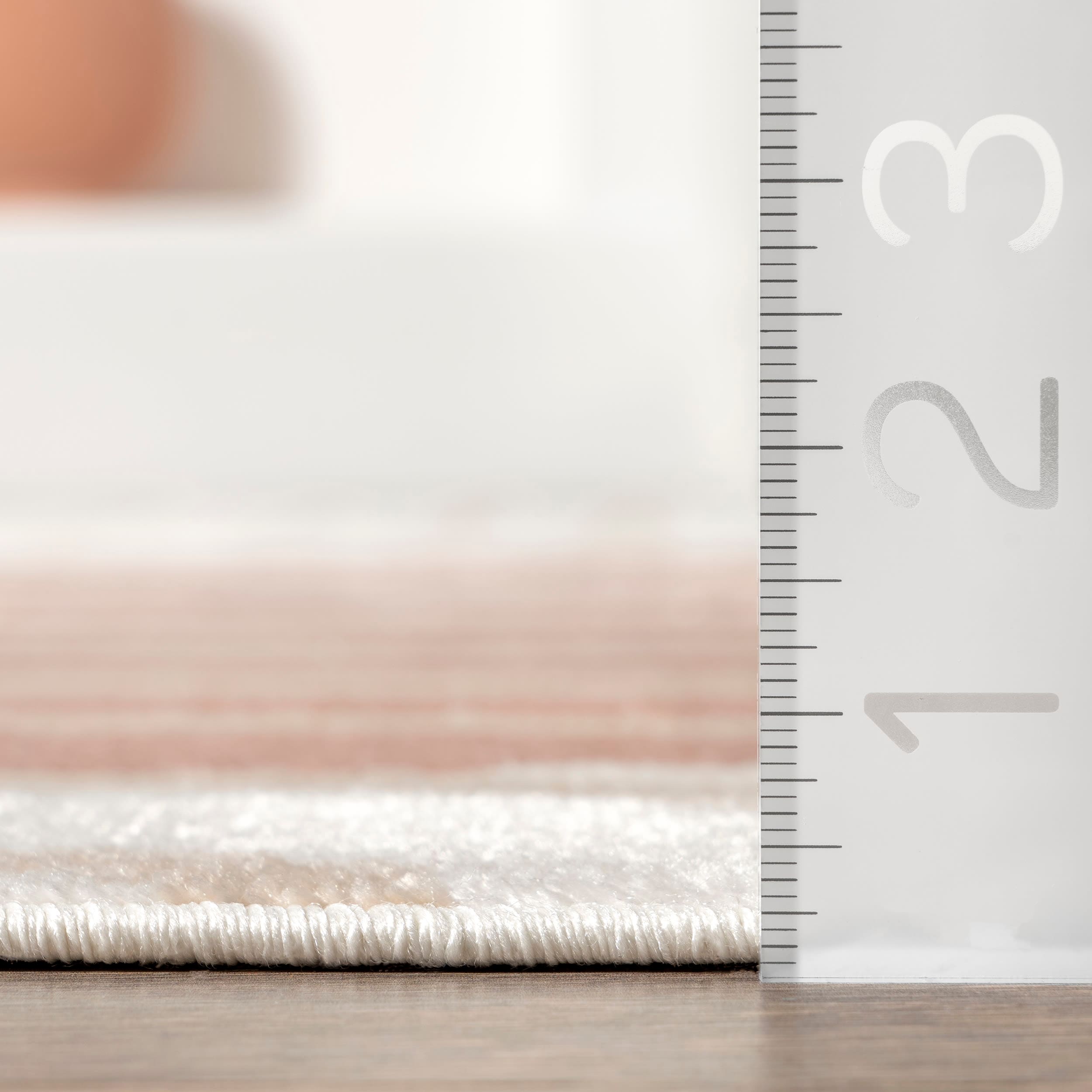 Blush and Ivory Abstract Synthetic 9' x 12' Area Rug