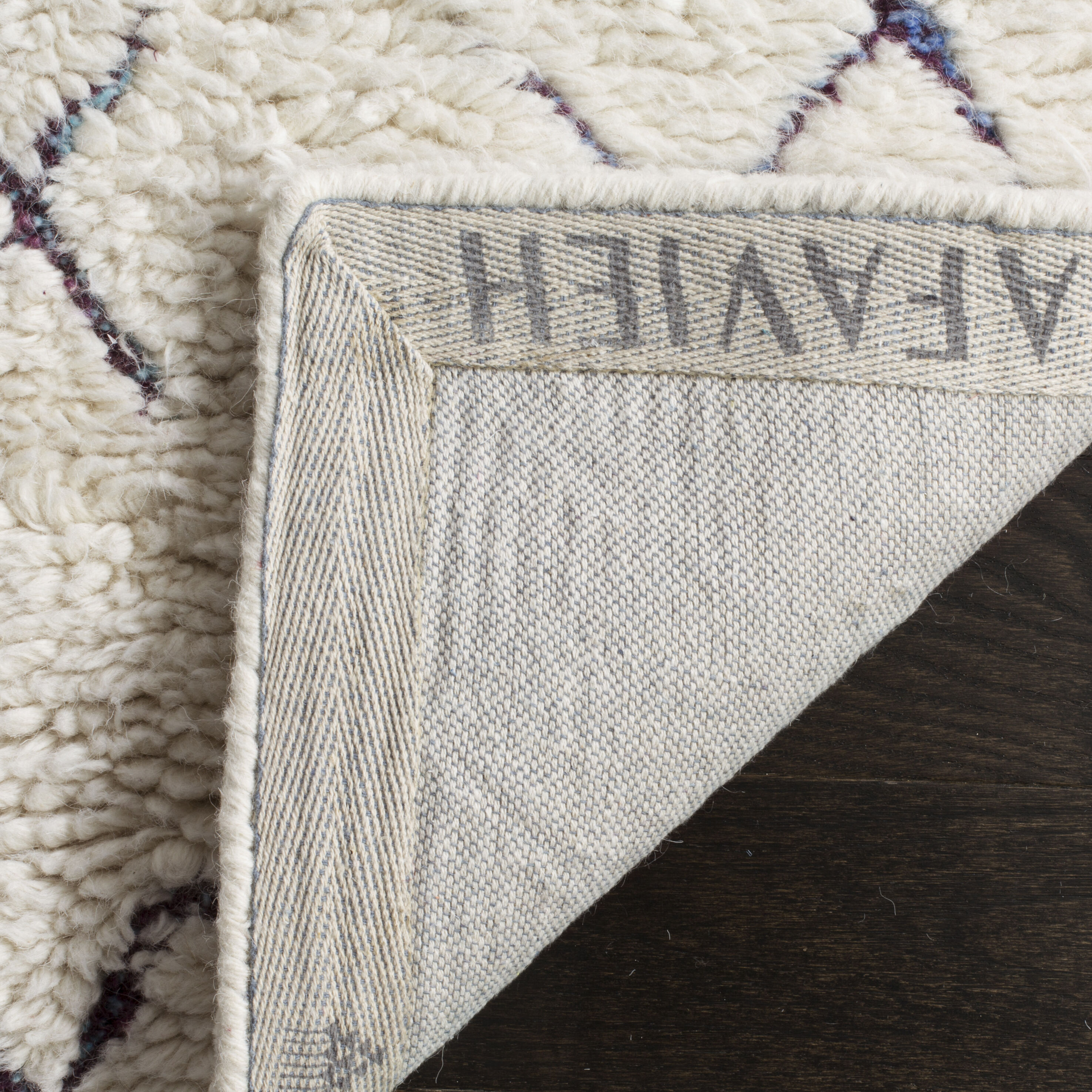 Ivory Hand-Tufted Wool Shag Area Rug 6' x 9'