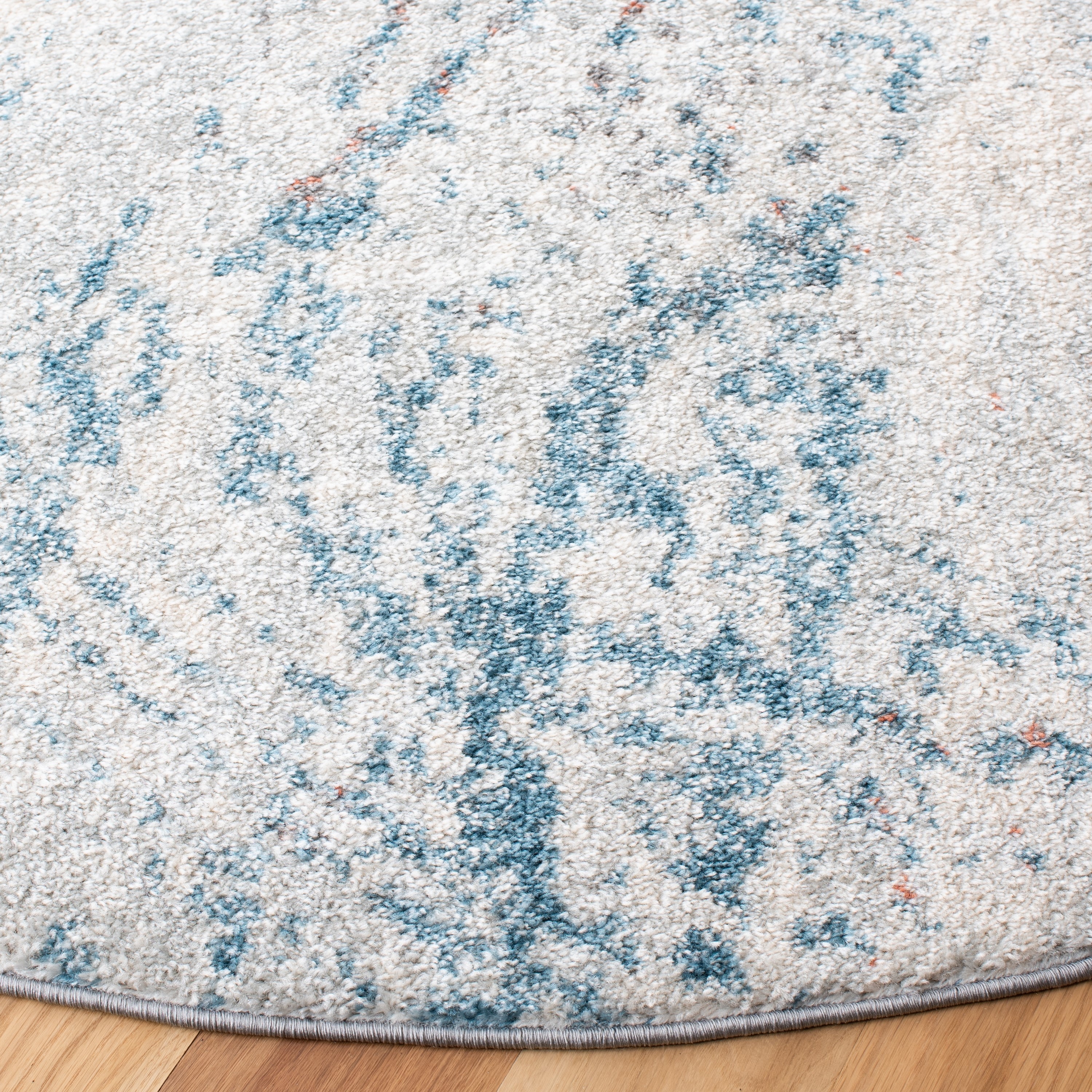 Ivory and Blue Round Abstract Hand-knotted Rug