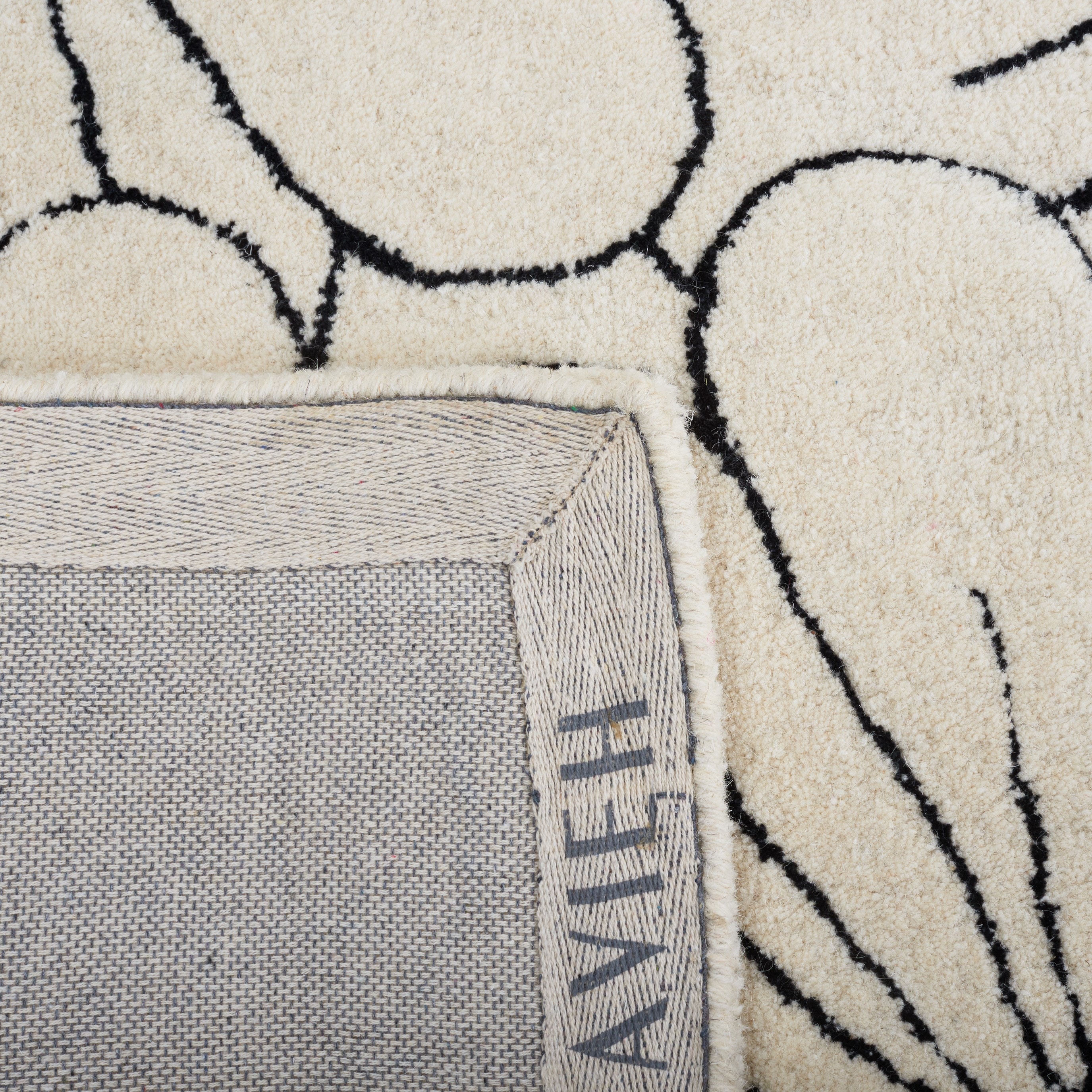 Ivory Handmade Round Tufted Wool and Viscose Rug, 2' x 3'
