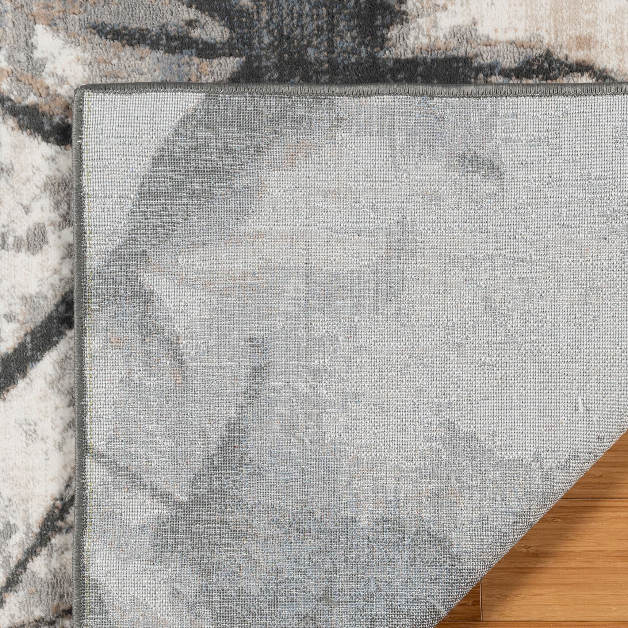 Gray Abstract Tufted Washable Reversible 5' x 7' Synthetic Rug