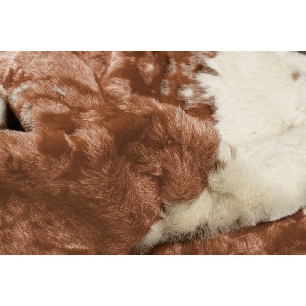 51" x 60" Brown and Ivory Faux Cowhide Area Rug