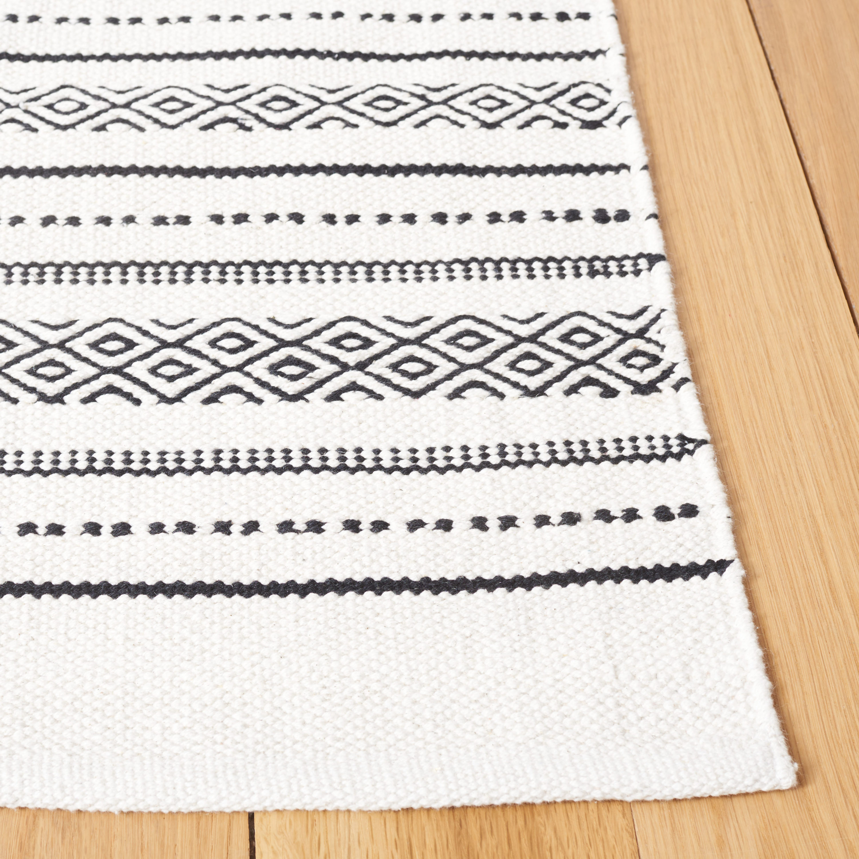 Handmade Black and Ivory Wool Cotton Striped 6' x 9' Area Rug
