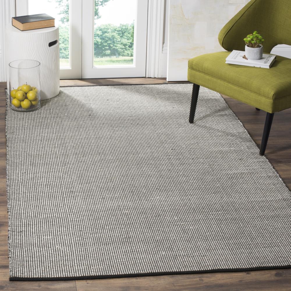 Ivory & Black Hand-Woven Cotton and Wool Area Rug - 5' x 8'