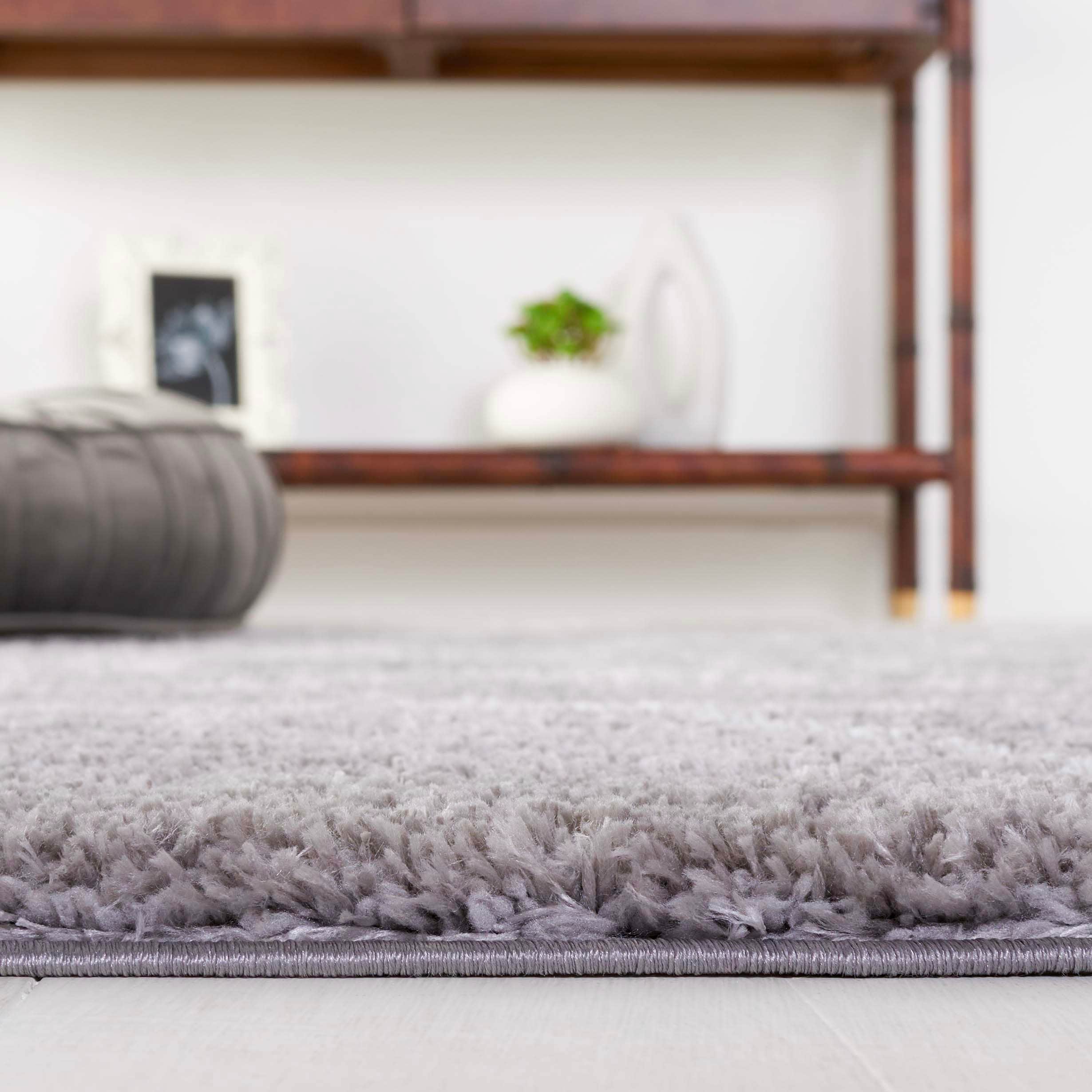 Ivory and Grey Abstract Shag 5' x 7' Synthetic Area Rug