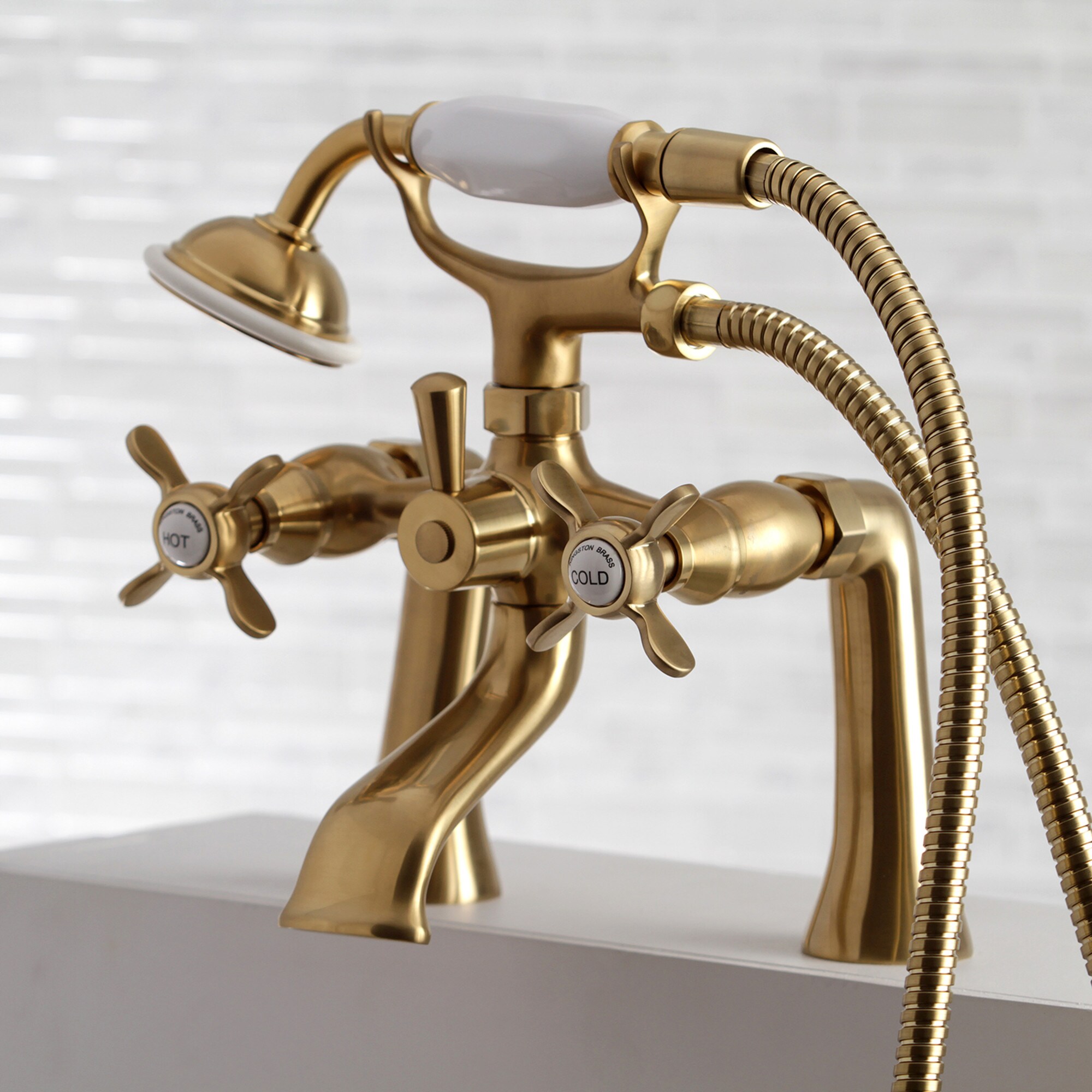 Kingston Brass WLKS288SB Essex Brushed brass 3-handle Deck-mount Roman Low-arc Bathtub Faucet with Hand Shower ( Valve Included )