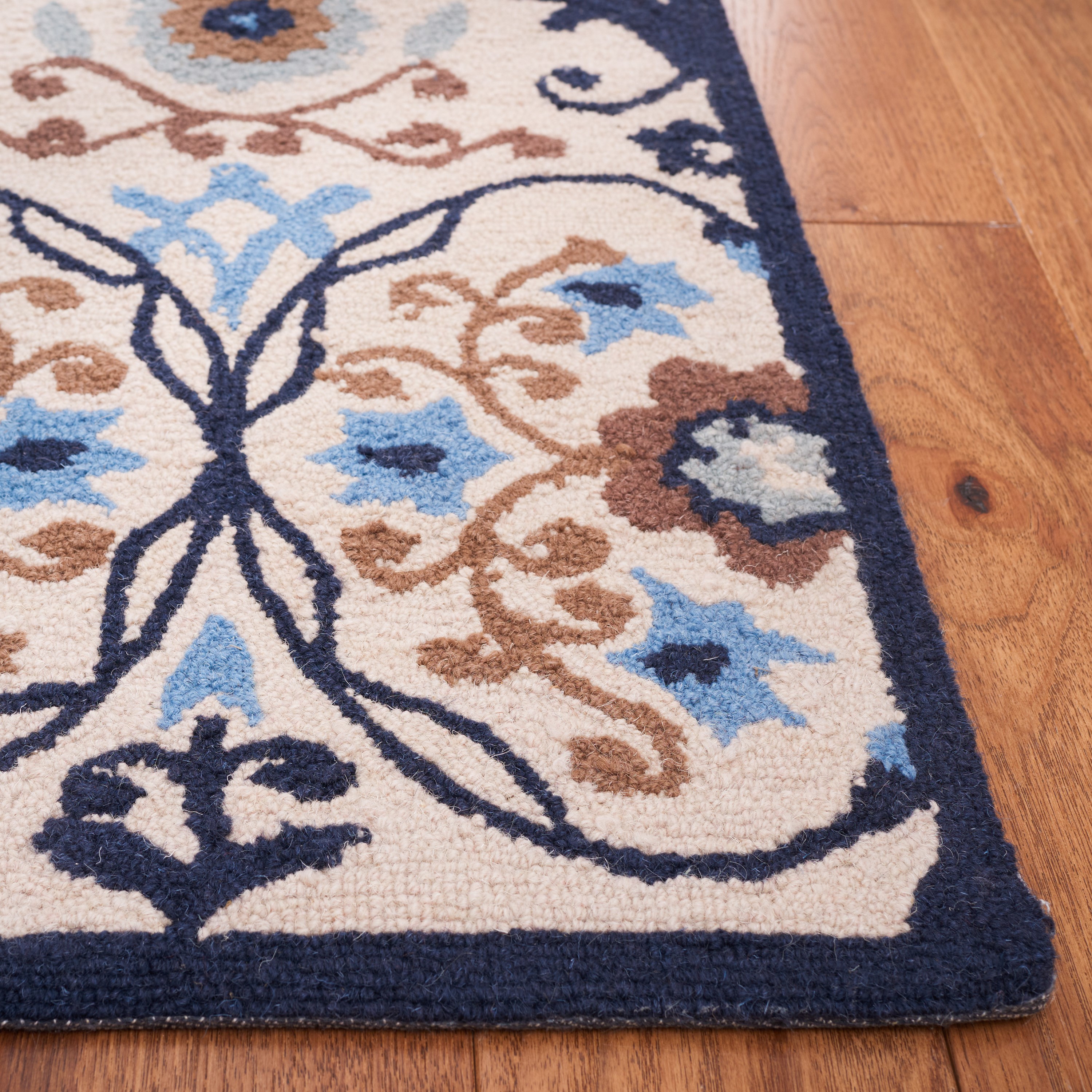 Handmade Ivory and Navy Floral Wool Rectangular Rug 4' x 6'