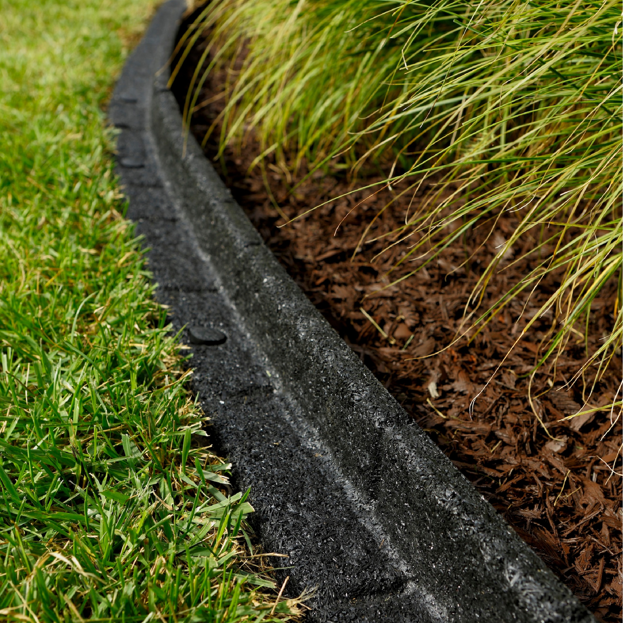 Rubberific 4-ft x 3-in Black Rubber Landscape Edging Section in the ...