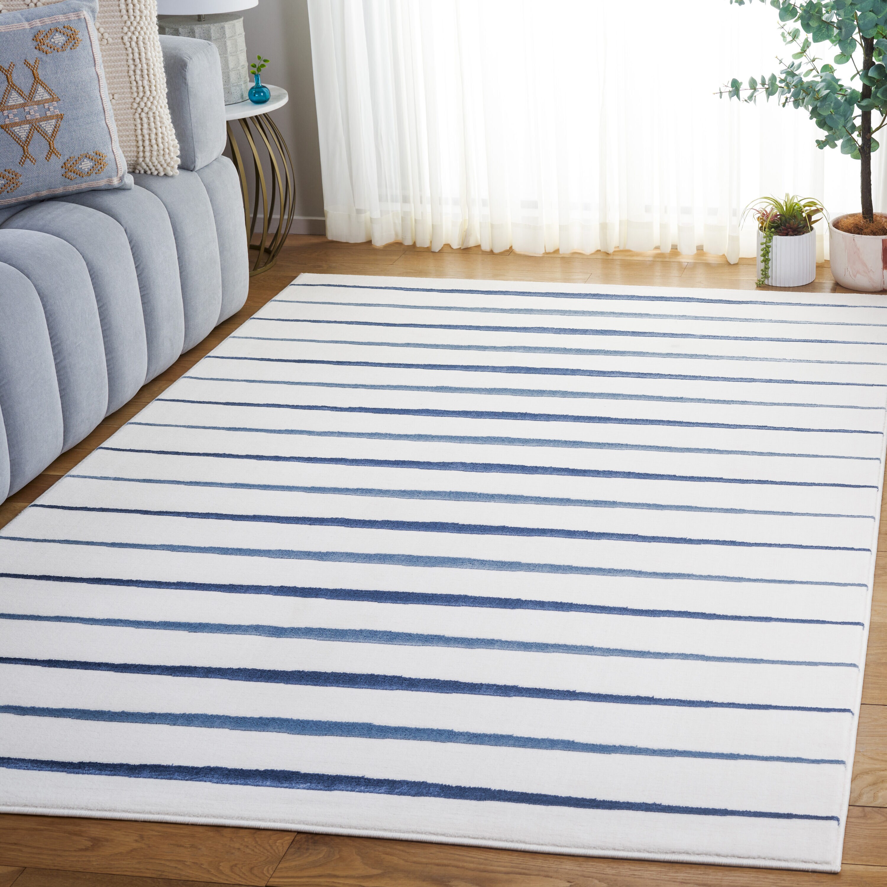 Groove 5 x 8 (ft) Loomed Polyester/Polypropylene Ivory/Blue Rectangular Indoor Stripe Mid-Century Modern Professionally Clean Only Area rug