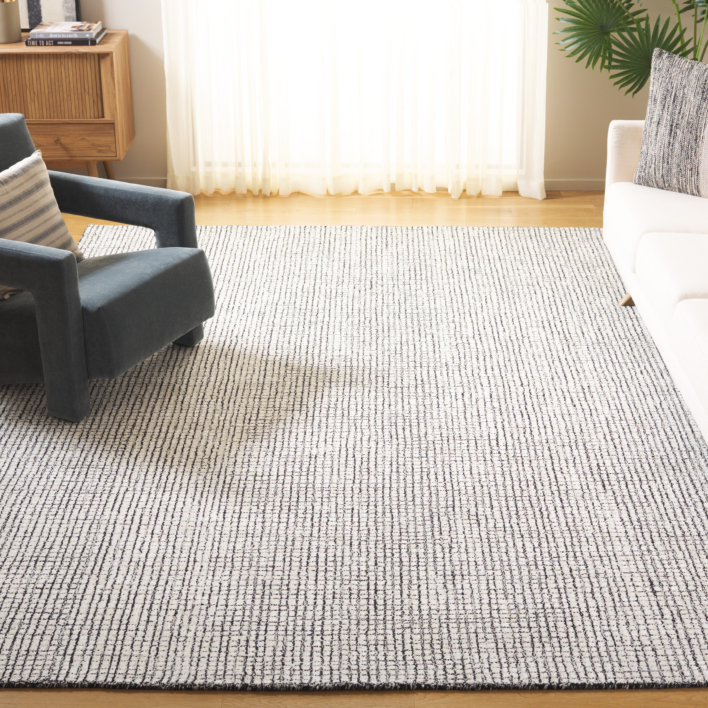Abstract 9 x 12 (ft) Tufted Wool Ivory/Black Rectangular Indoor Solid Mid-Century Modern Spot Clean Only Area rug
