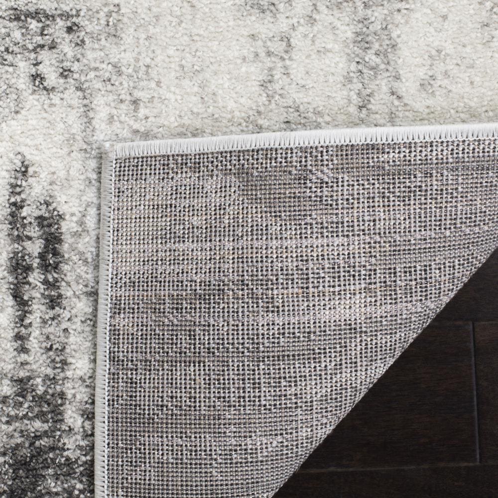 Ivory and Grey Round Synthetic Easy Care Area Rug